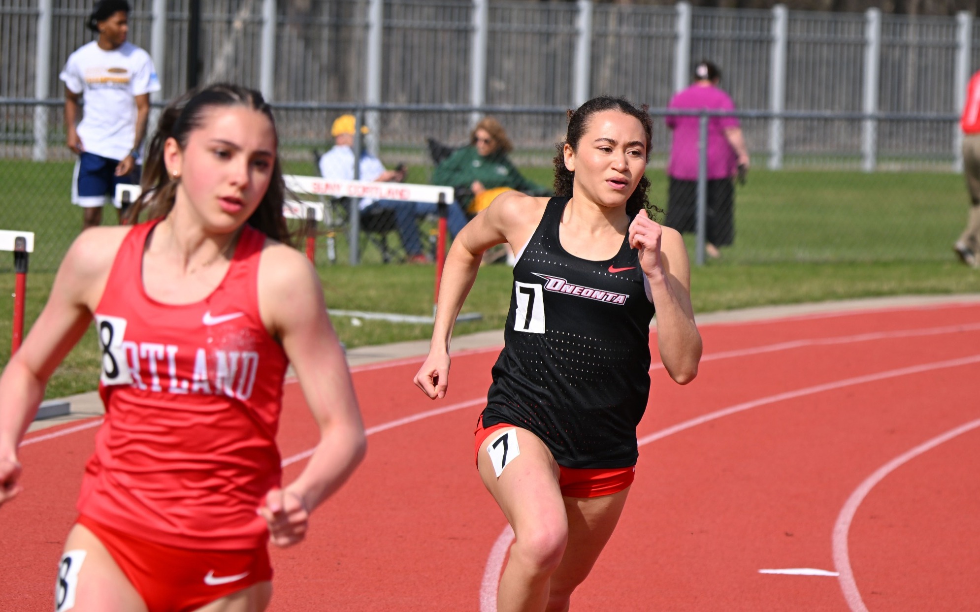 Natalia Sweat running the 1,500 meter 