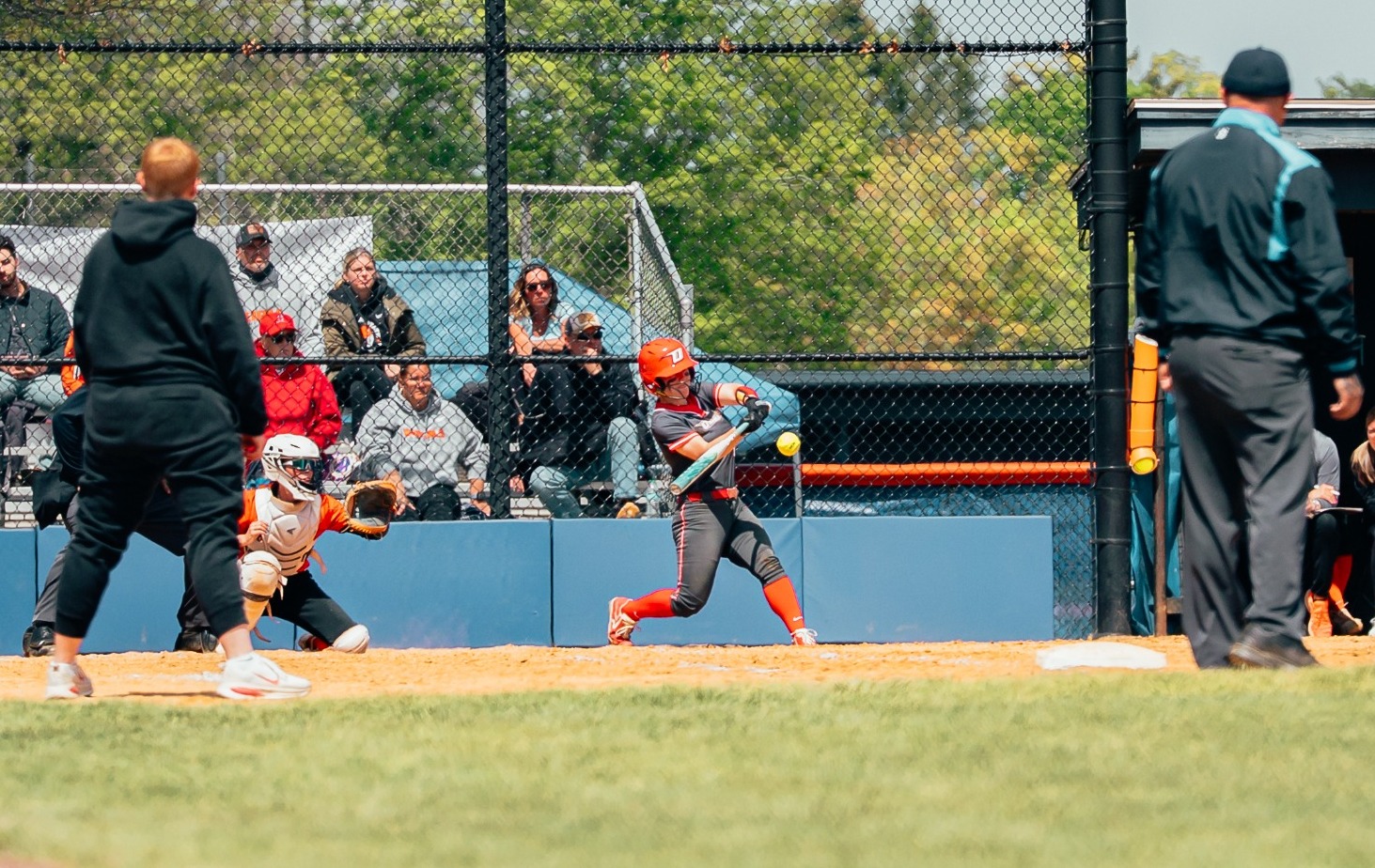 Eva Blaney hitting a pitch against Buffalo State in the SUNYAC Tournament