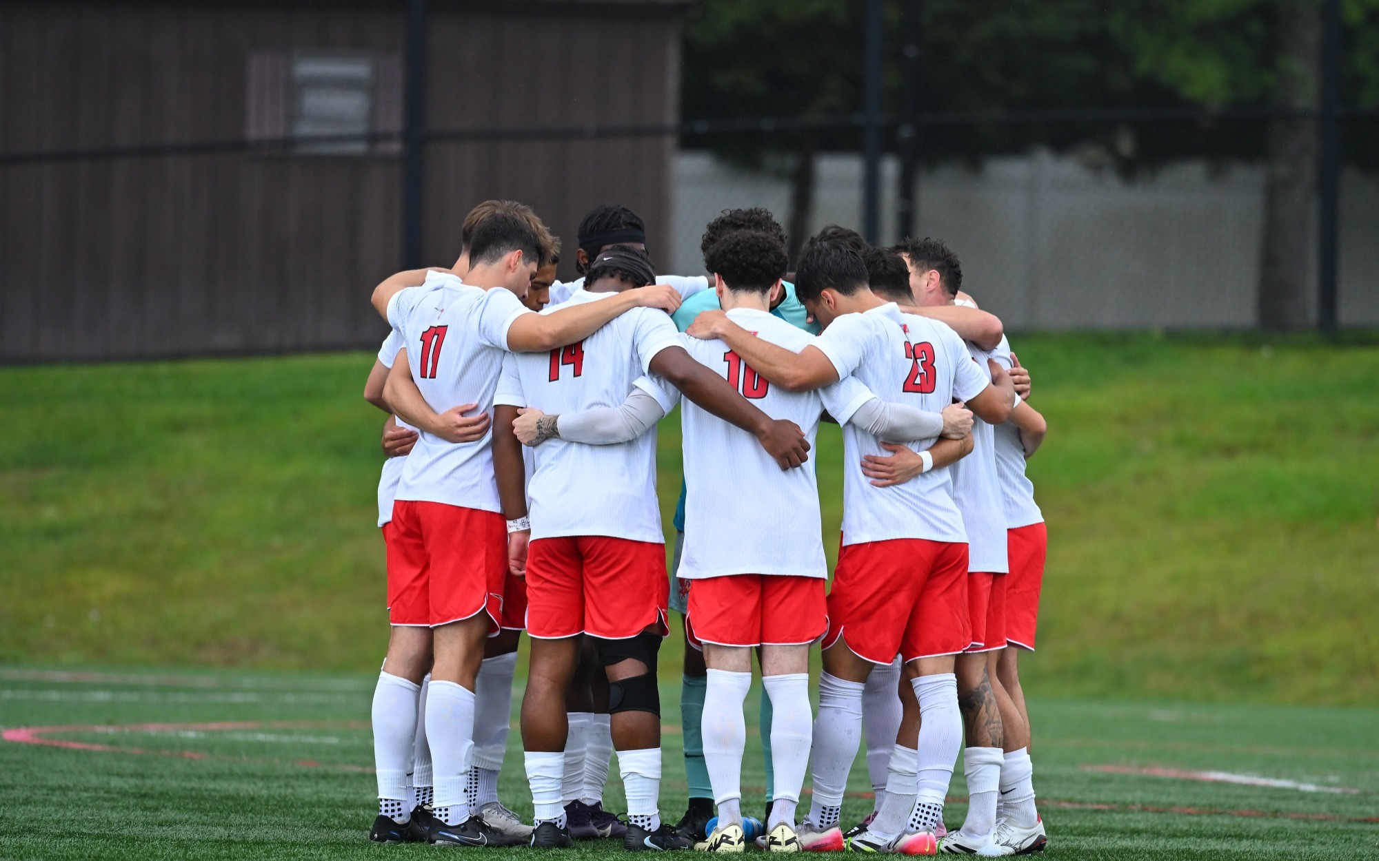Men's Soccer huddle