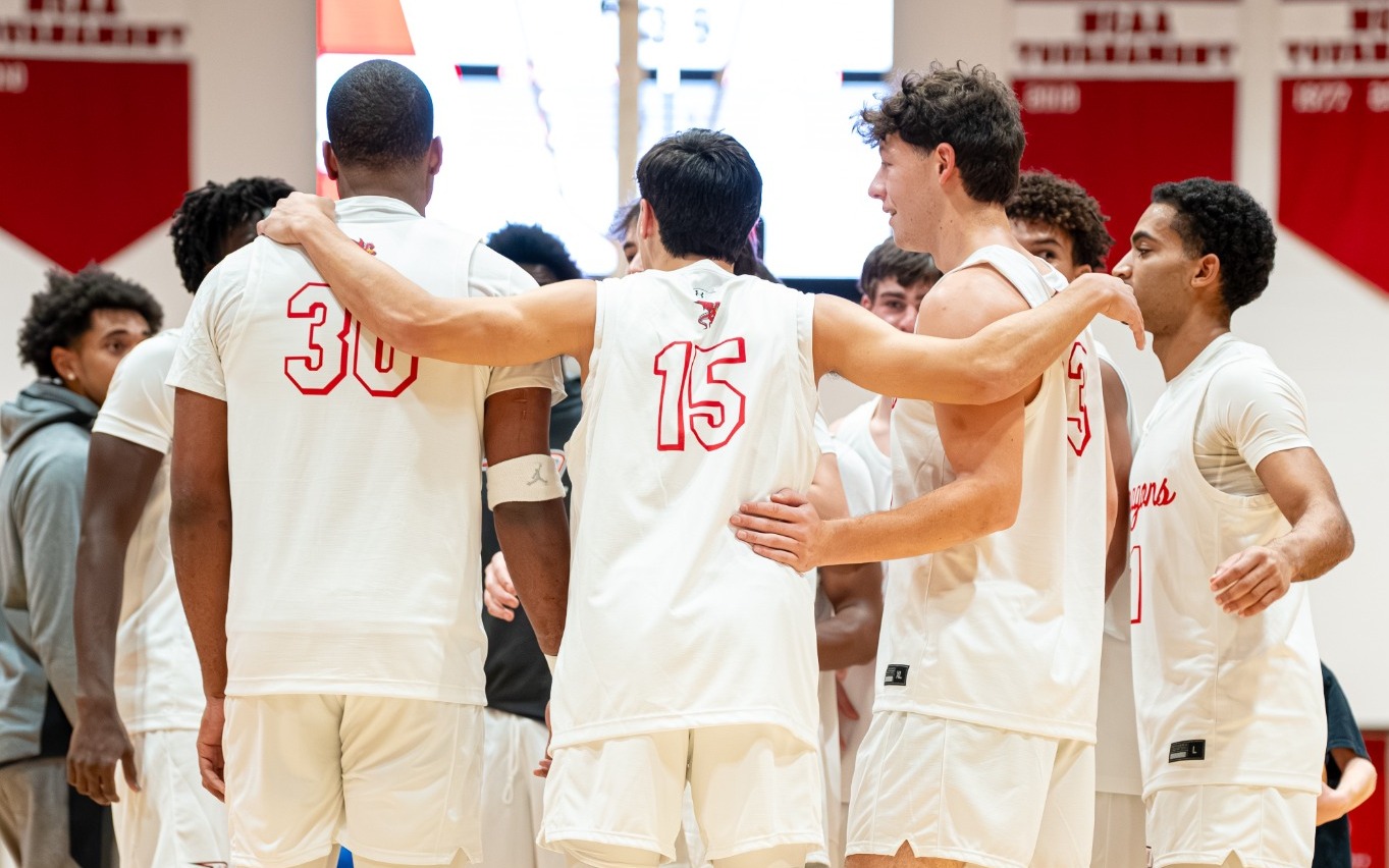 Men's basketball team huddle