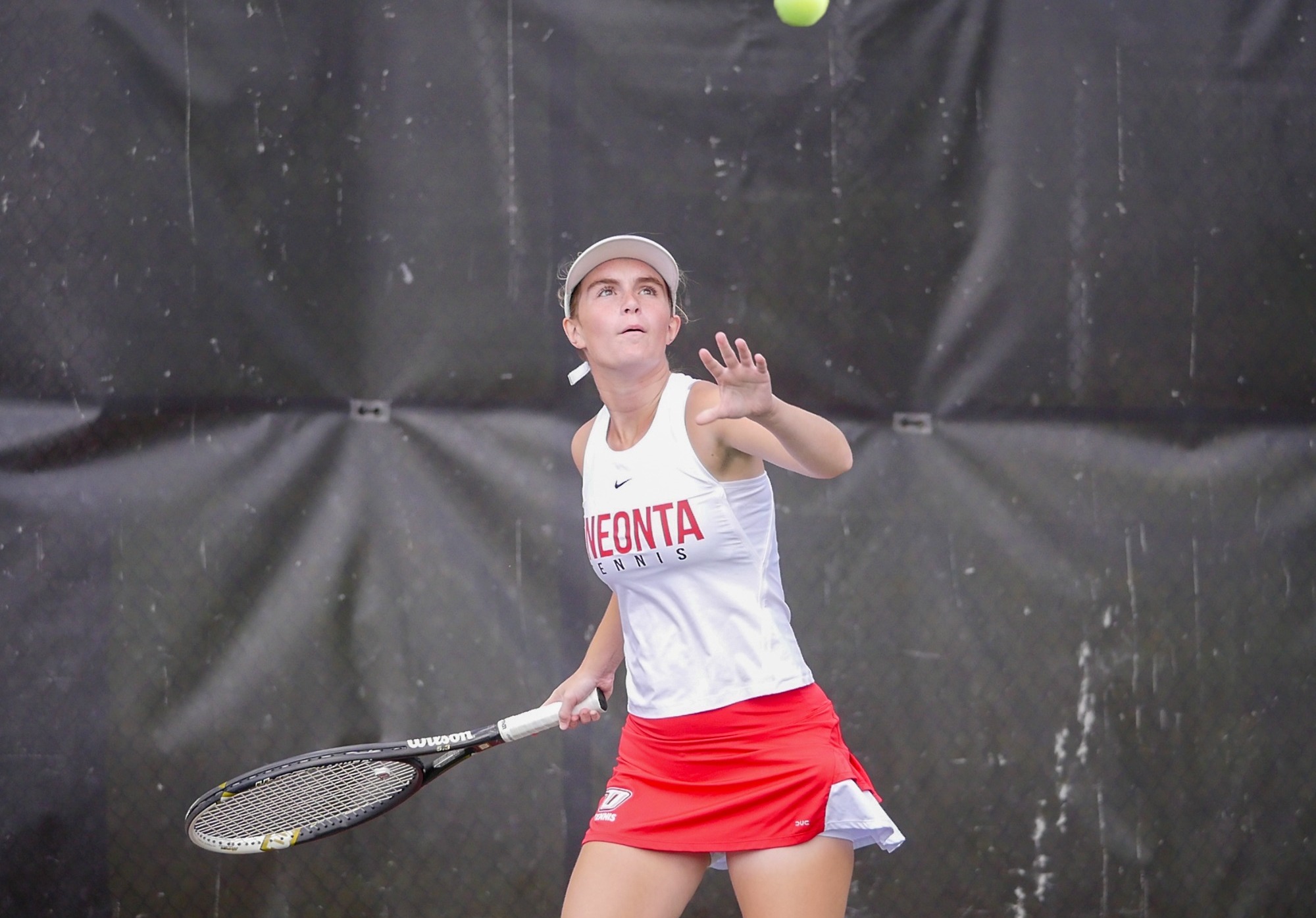 Taylor Plue looks to return a shot in her match against Delhi