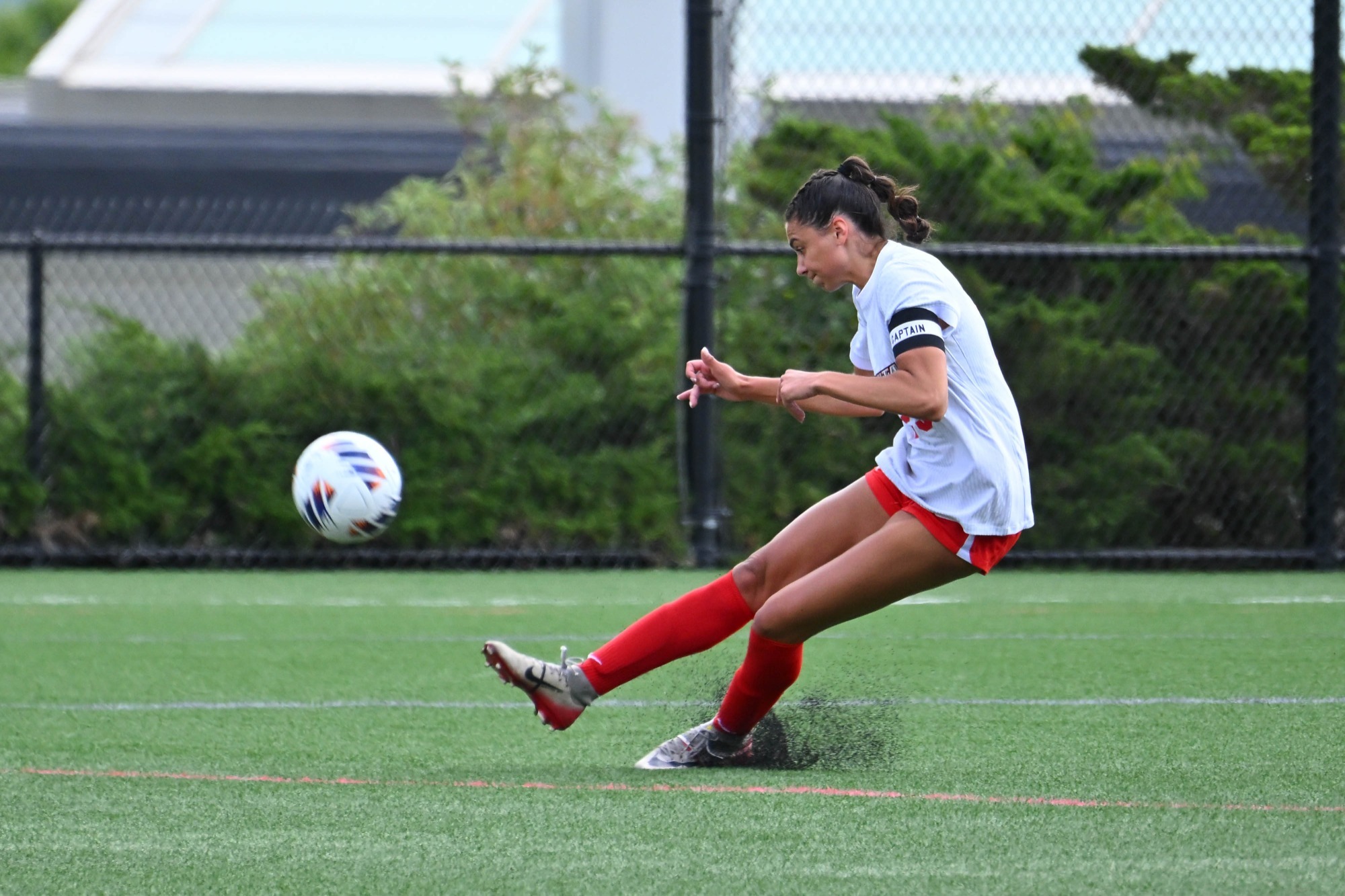 Dominique DiOrio takes a free kick against Clarkson