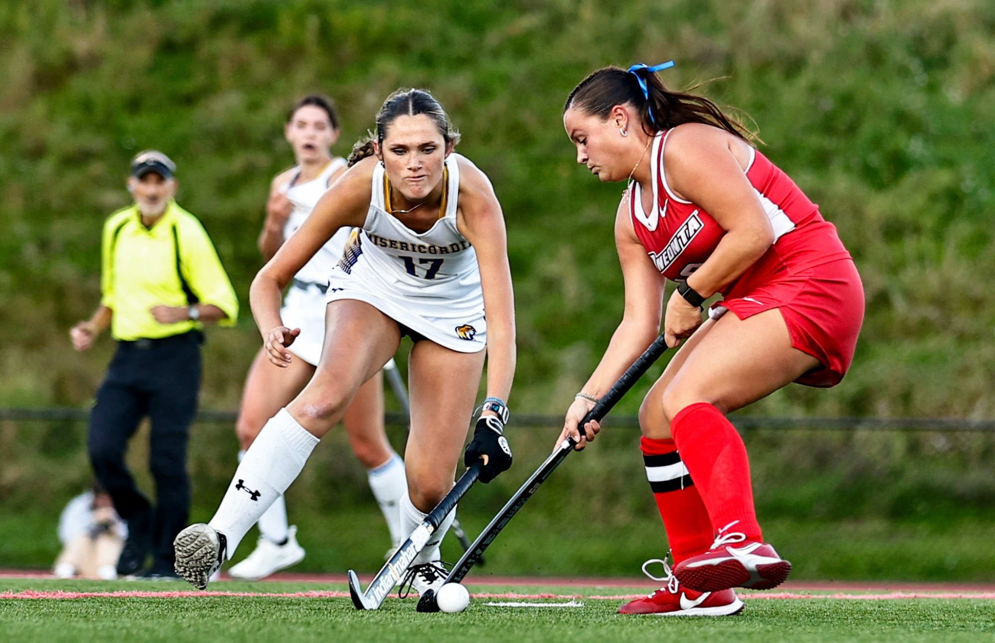 Ali Howell dribbles the ball against Misericordia