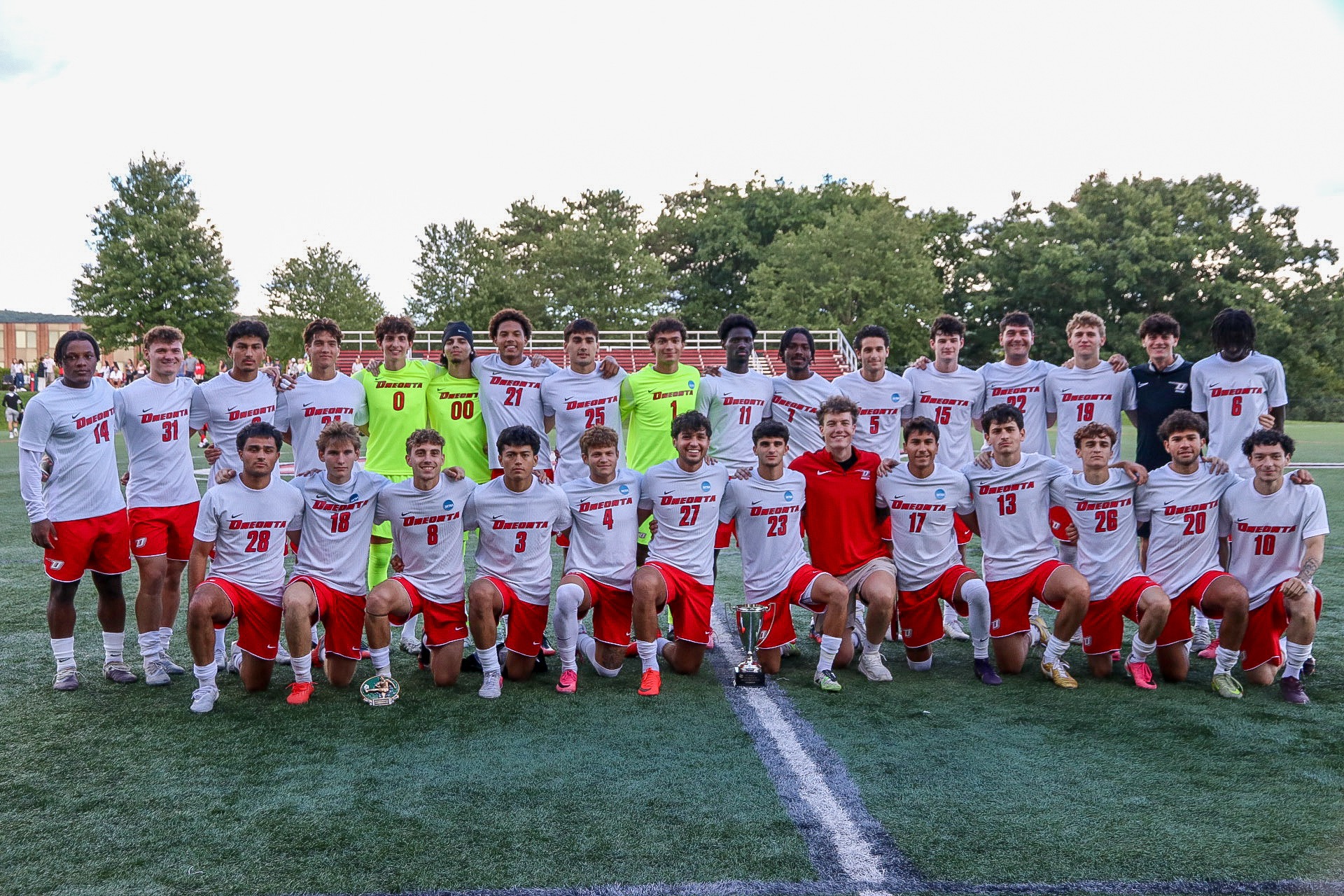 Men's Soccer Team Picture with 2026 Mayor's Cup Trophy