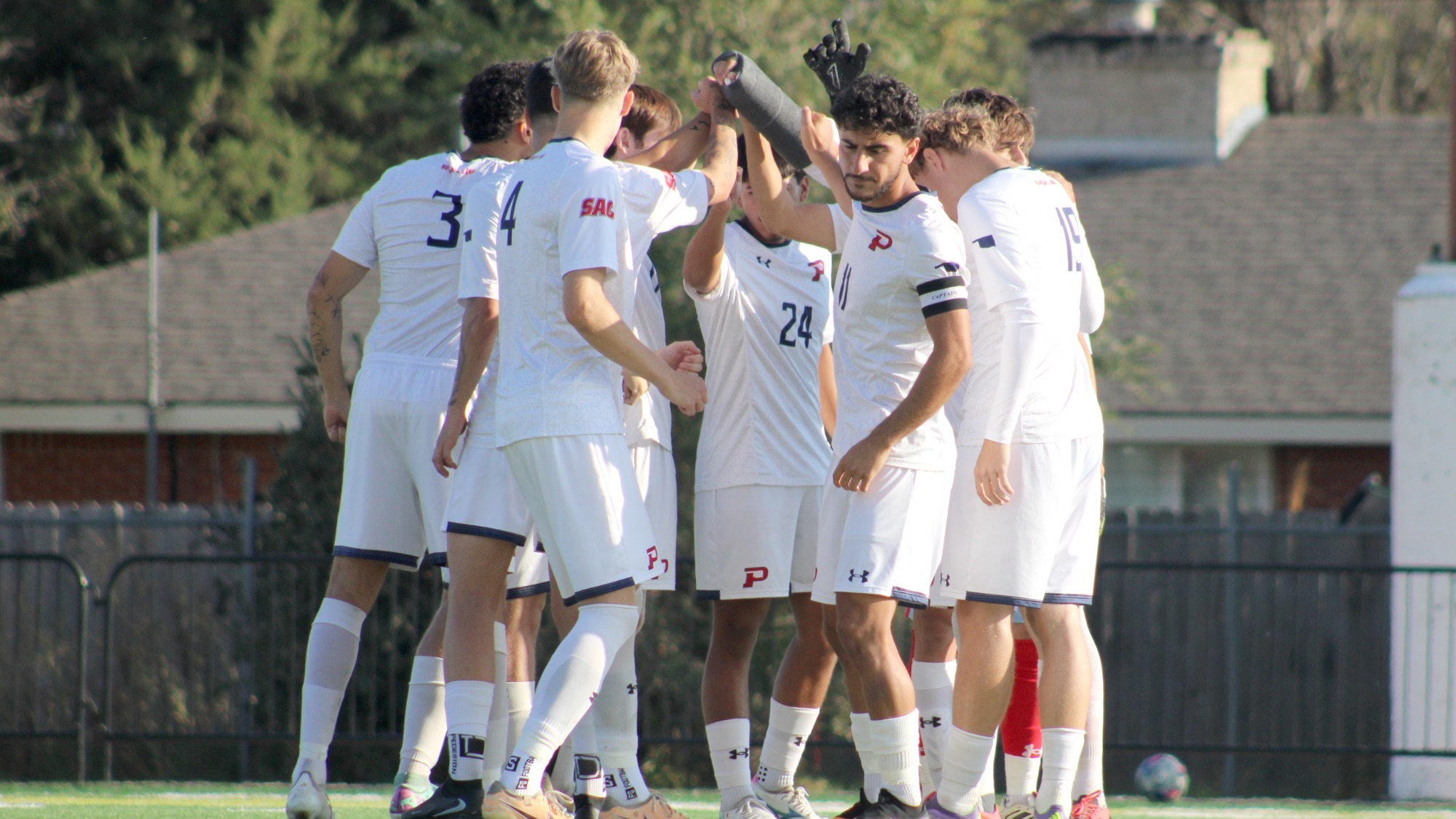 msoc_team_field_huddle