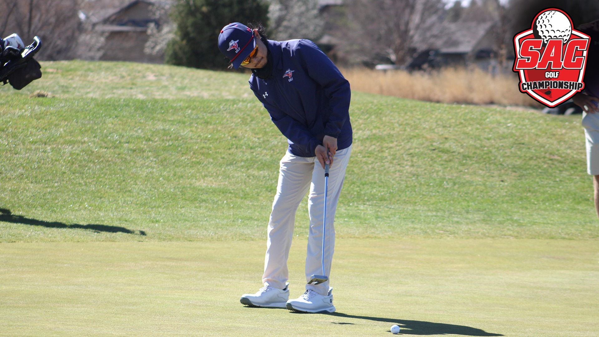 Thammachokecharoen Putts at Top of Texas with SAC Championship logo