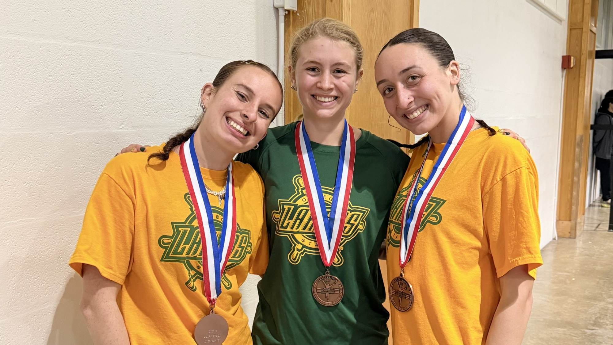 three womens cross country runners