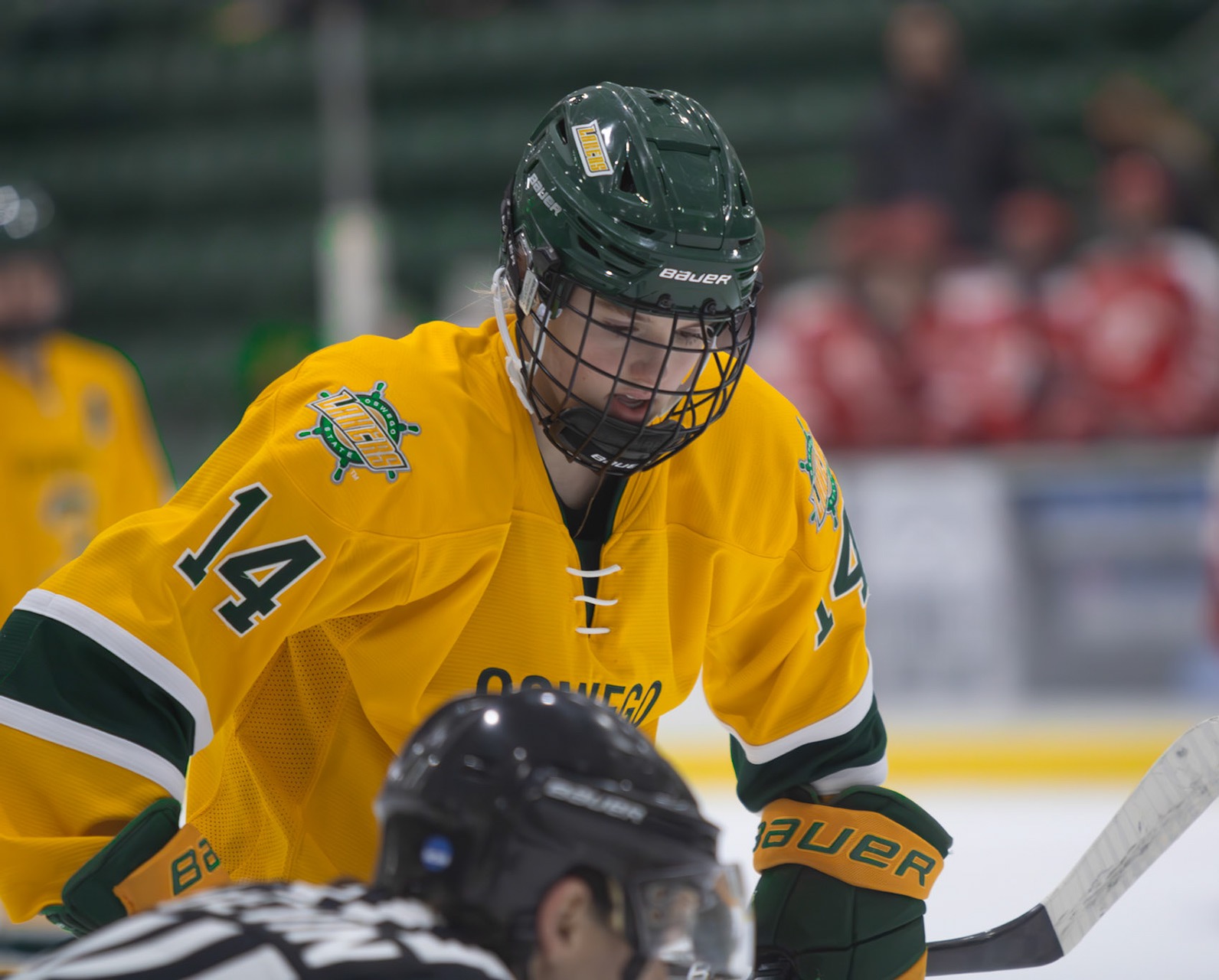 Oswego player getting ready for a face-off 
