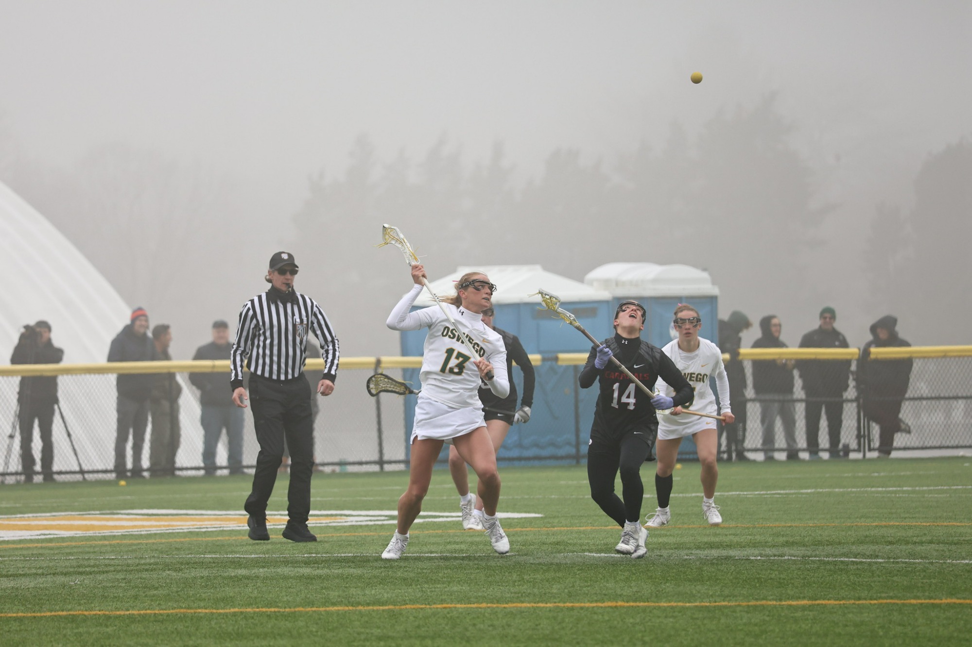 Julia Quirk taking the opening draw against plattsburgh