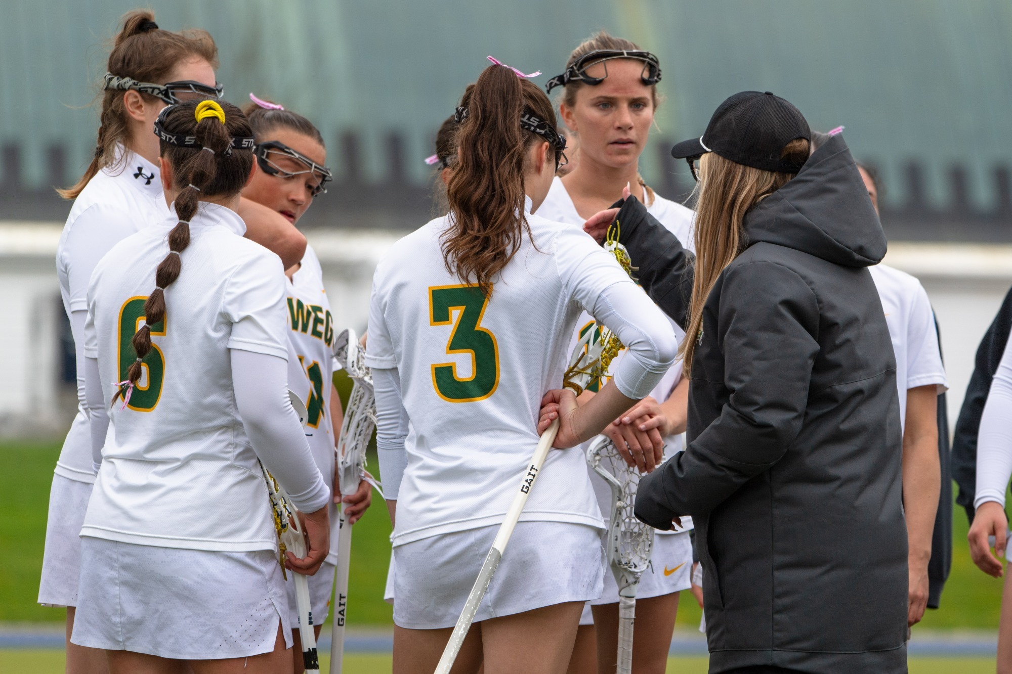 Womens lacrosse team huddle at the ncaa tournament 