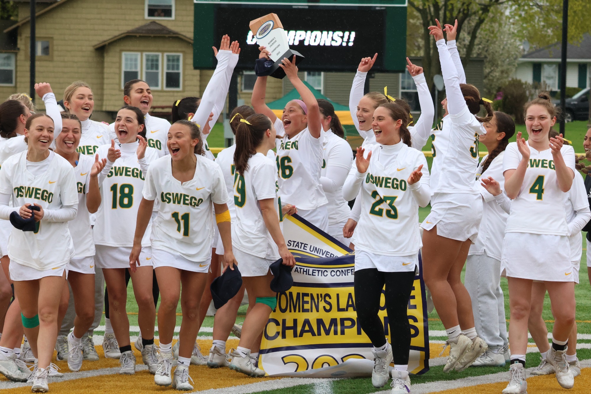 Womens lacrosse celebrating 