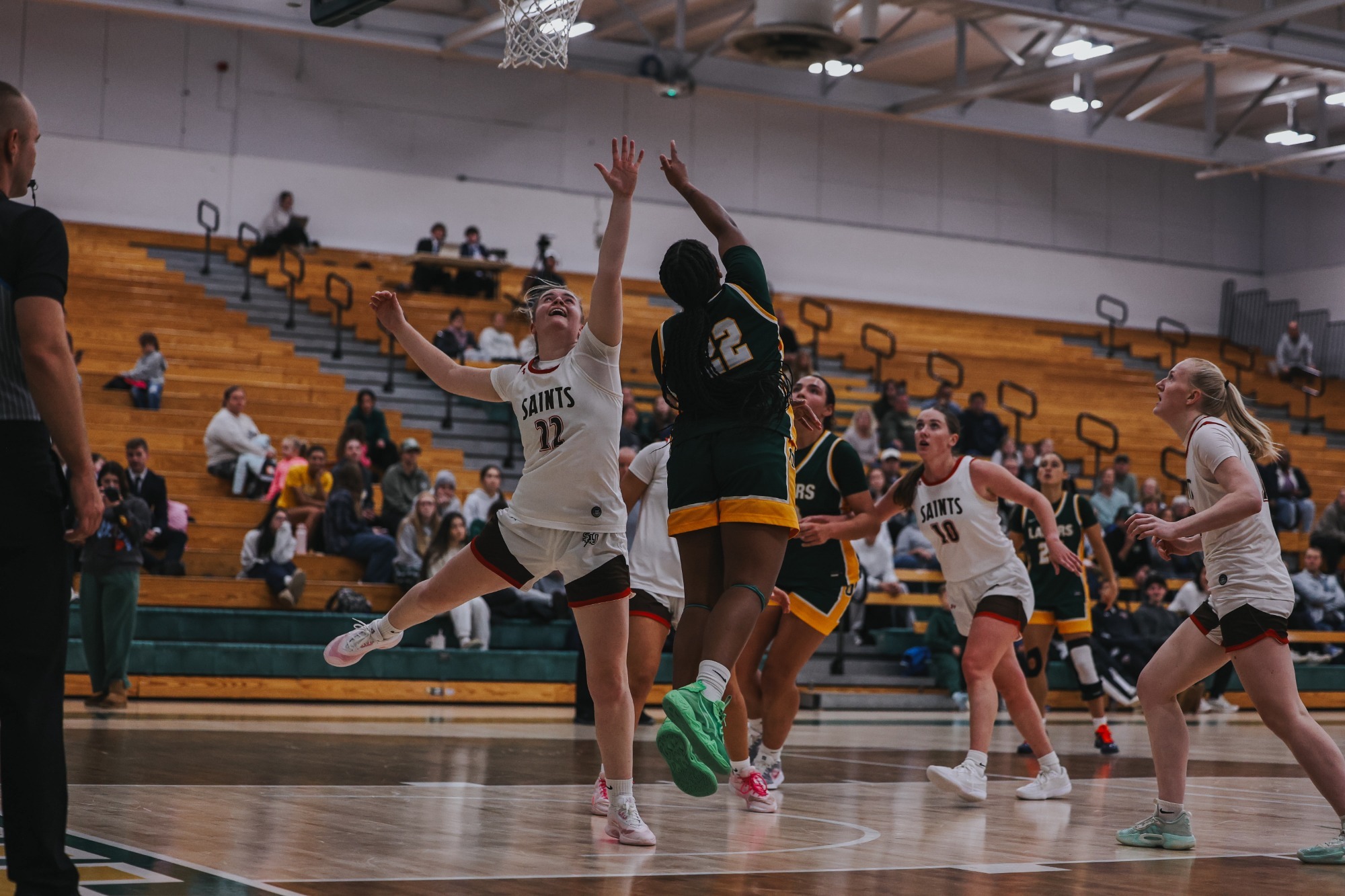 womens basketball going for a layup