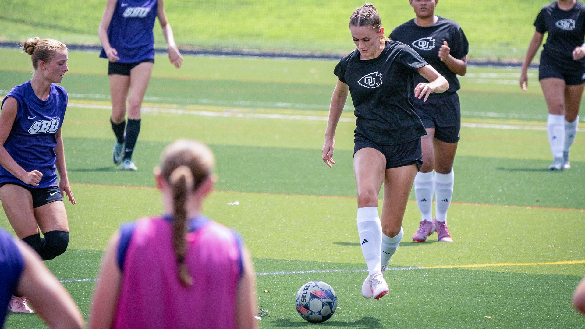 Charlotte Gatehouse settles a pass during a scrimmage against Southwest Baptist University.