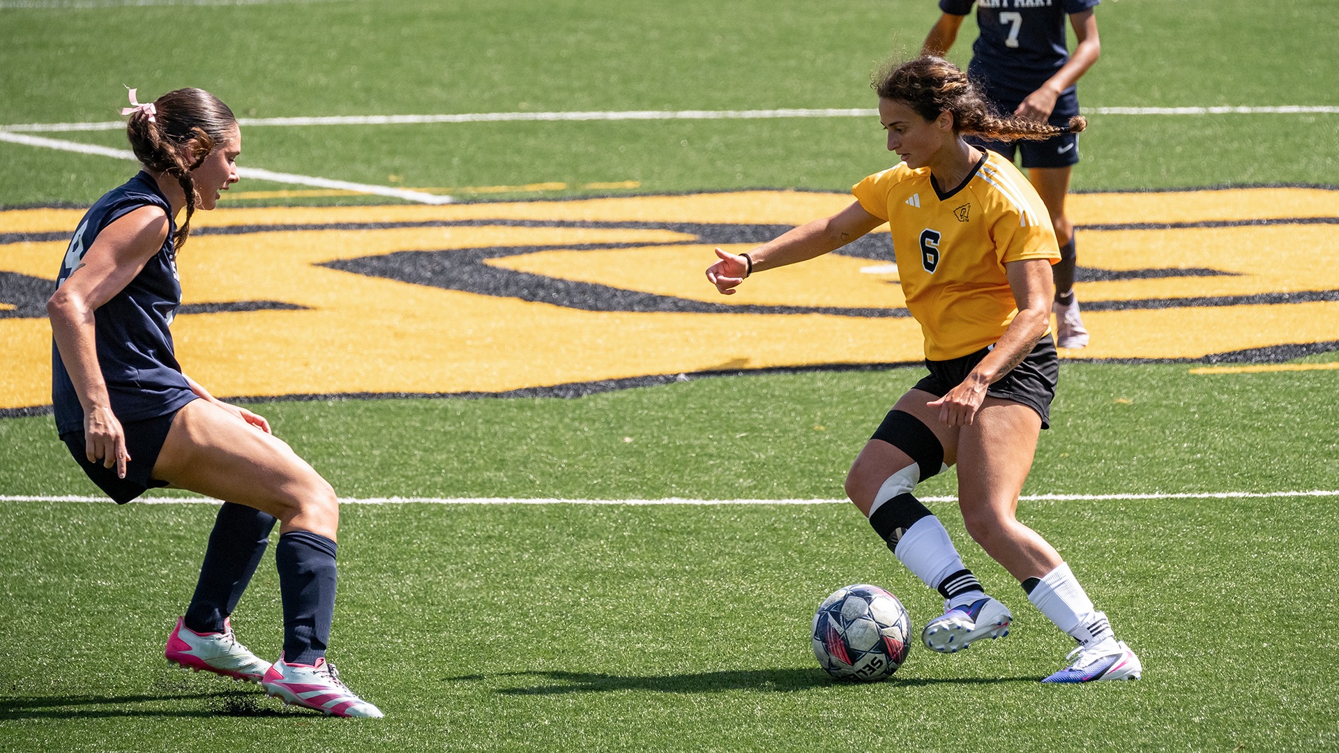 Cennet Donahue dribbles past a University of Saint Mary defender during Ottawa's 2-1 win on Wednesday.