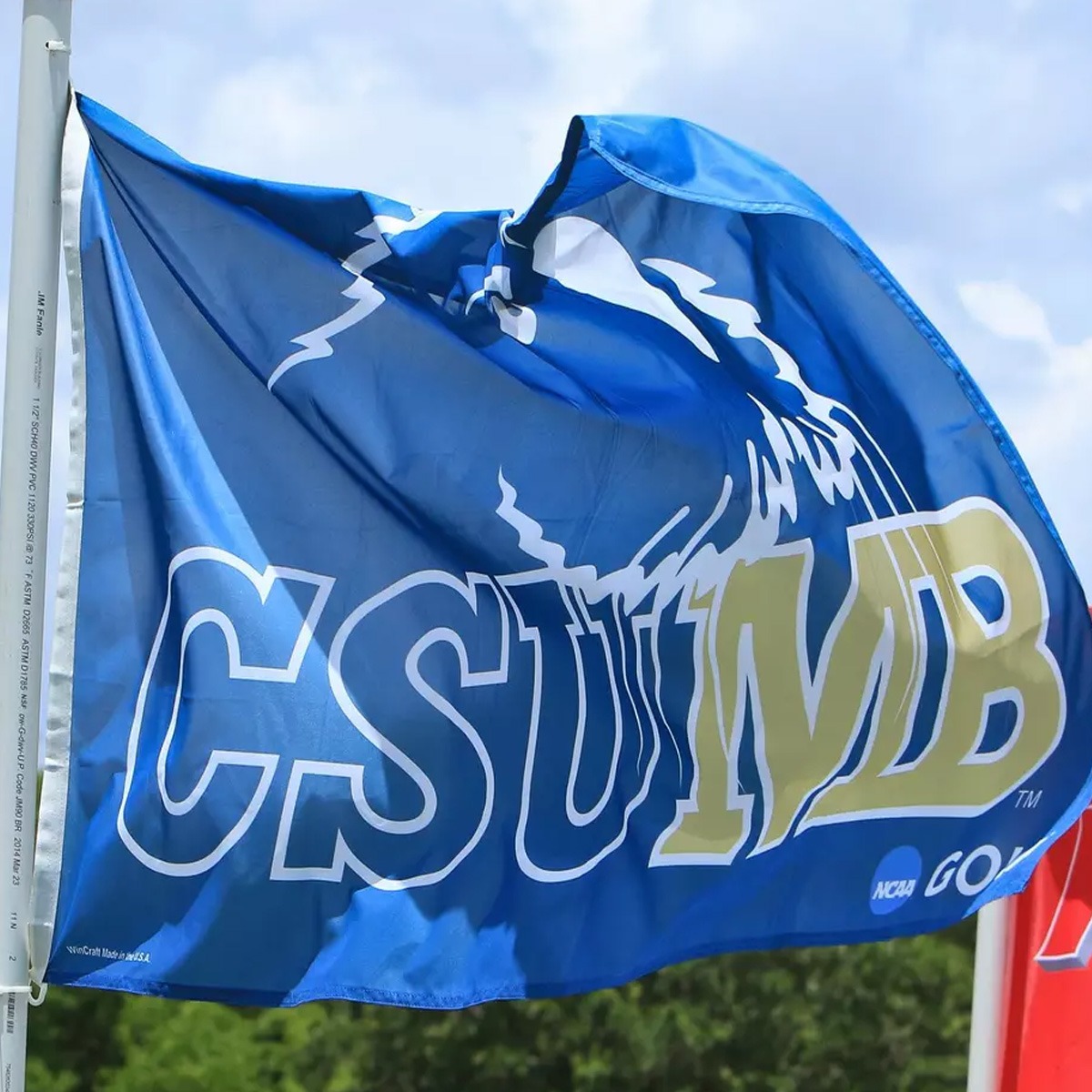 Image of CSUMB Otters flag at the NCAA DII Men's Golf National Championship.