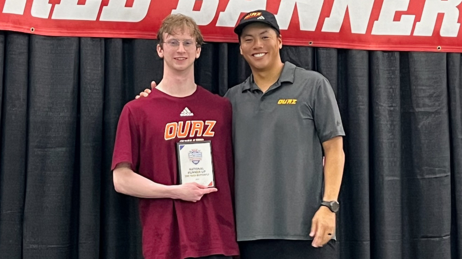 Reuben Dobson poses with OUAZ head coach Brendan Nuygen