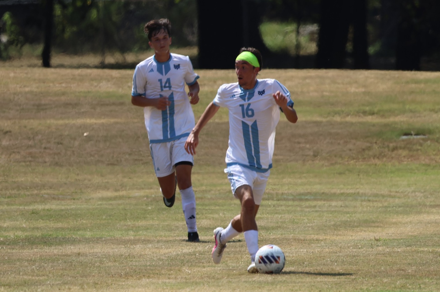 Drake Ballard dribbles the ball