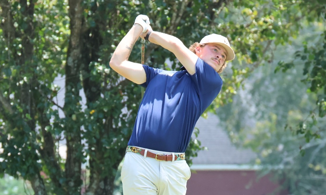 Carson Minish hits a drive