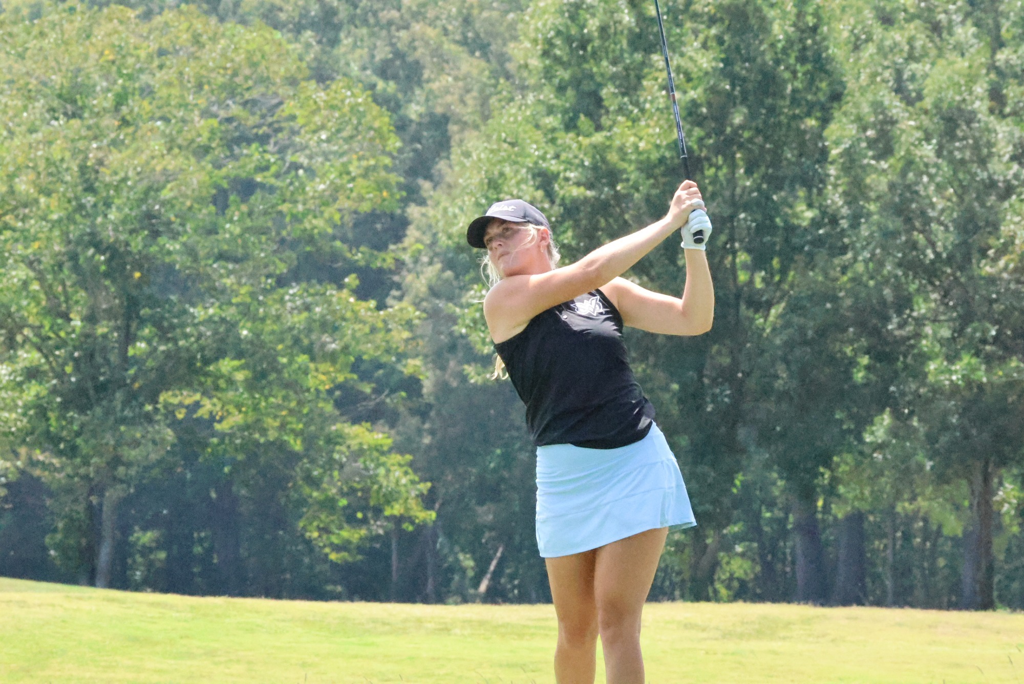 Ashley Estabrook tees off