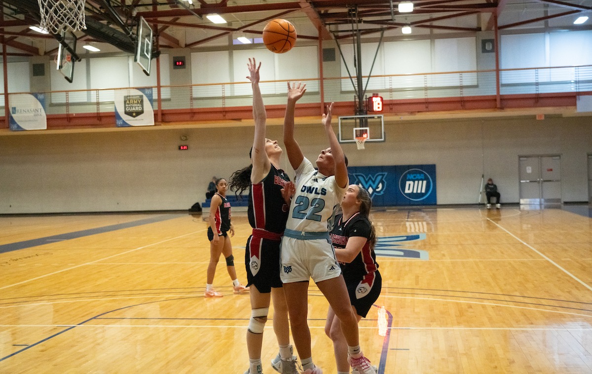 Conley Langford (22) goes up for a shot versus Blackburn