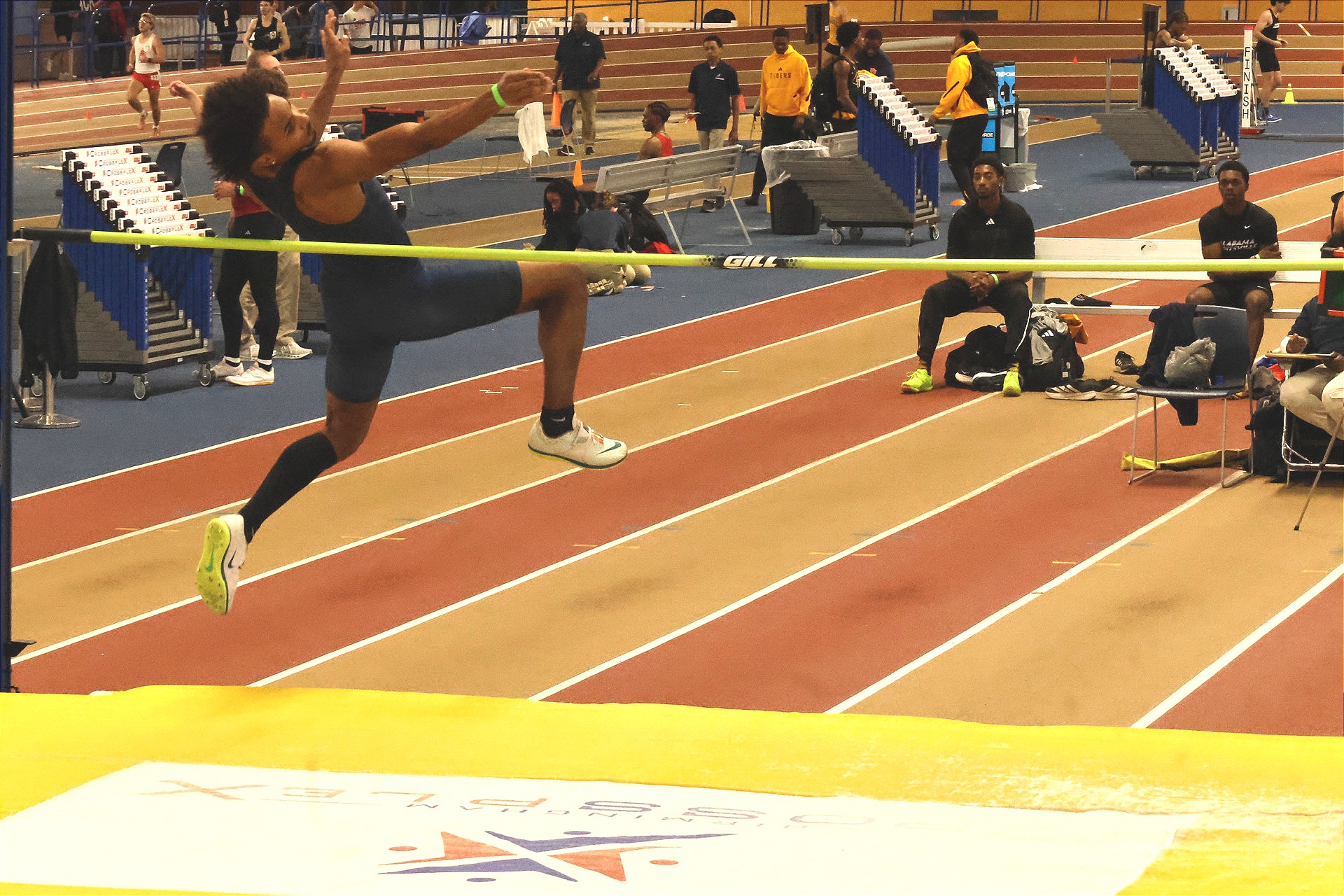 Malachi Morgan competes in the high jump