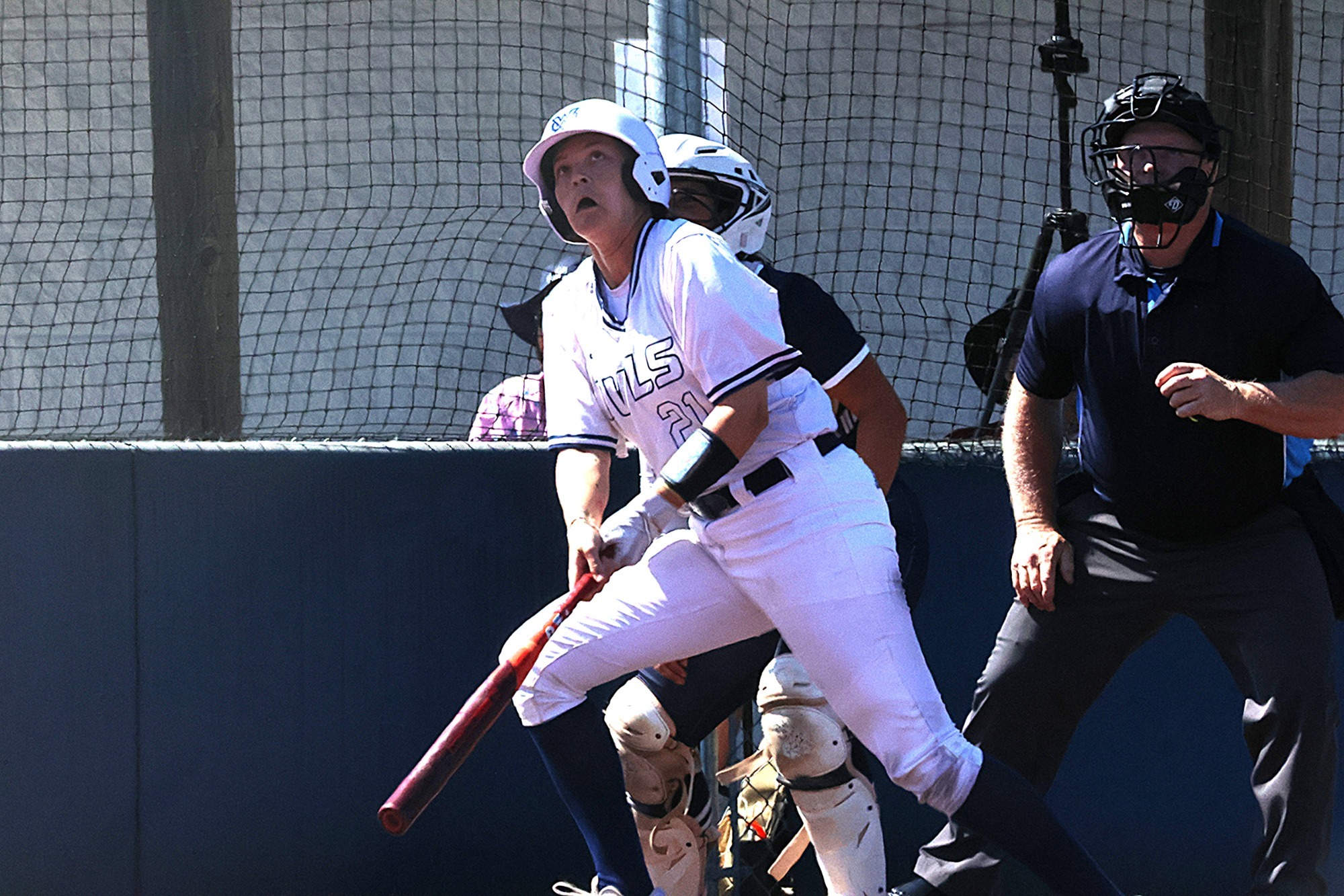 MC Brown watches her walk-off homer leave to field.