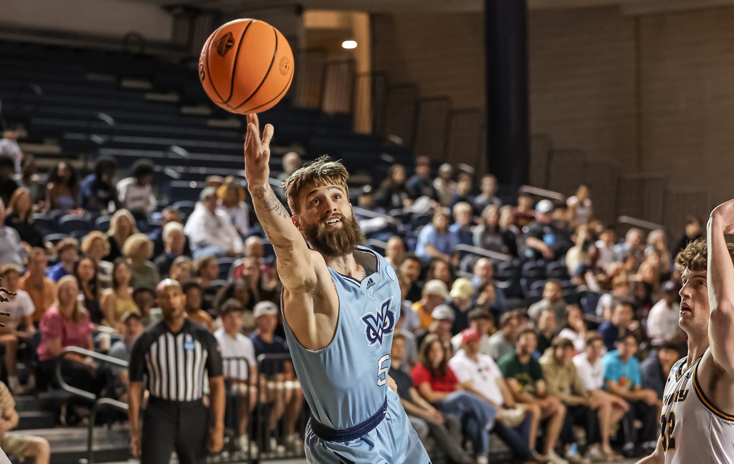 Joe Haze Austin lays up a shot at the NCAA III first round game
