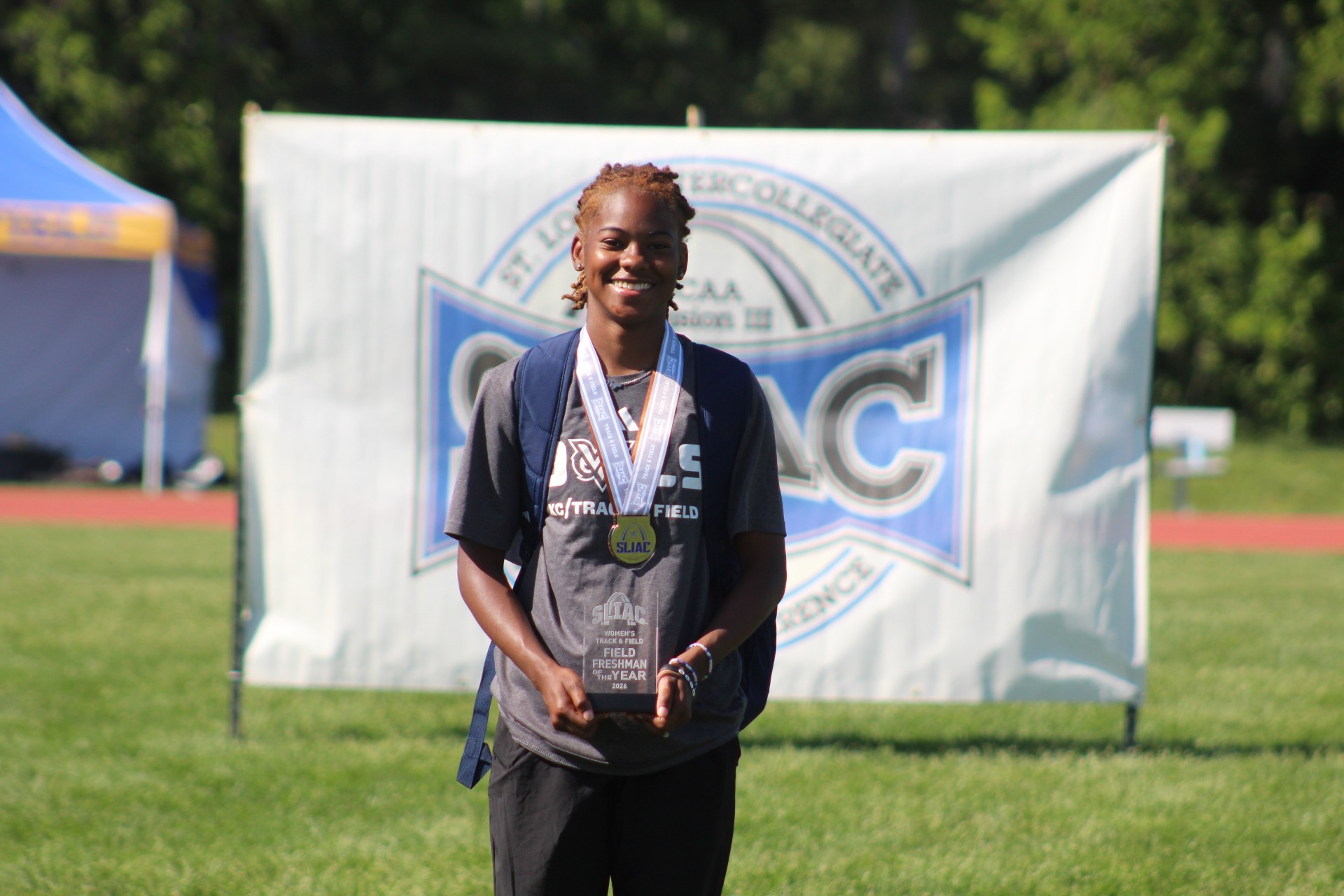 Ariella Jones holding her Freshman of the Year award