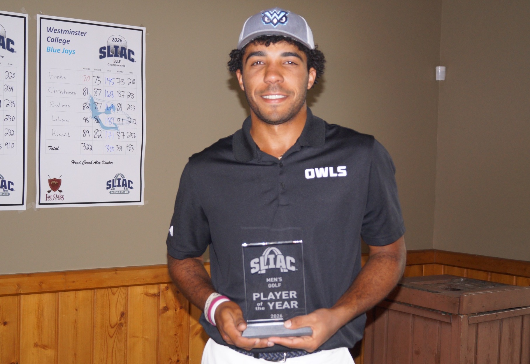 Cameron James holds the Player of th e Year award