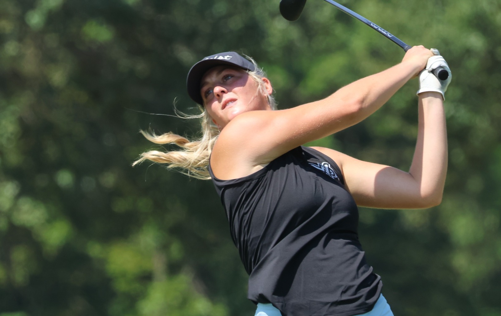 Ashley Estabrook hits a tee shot