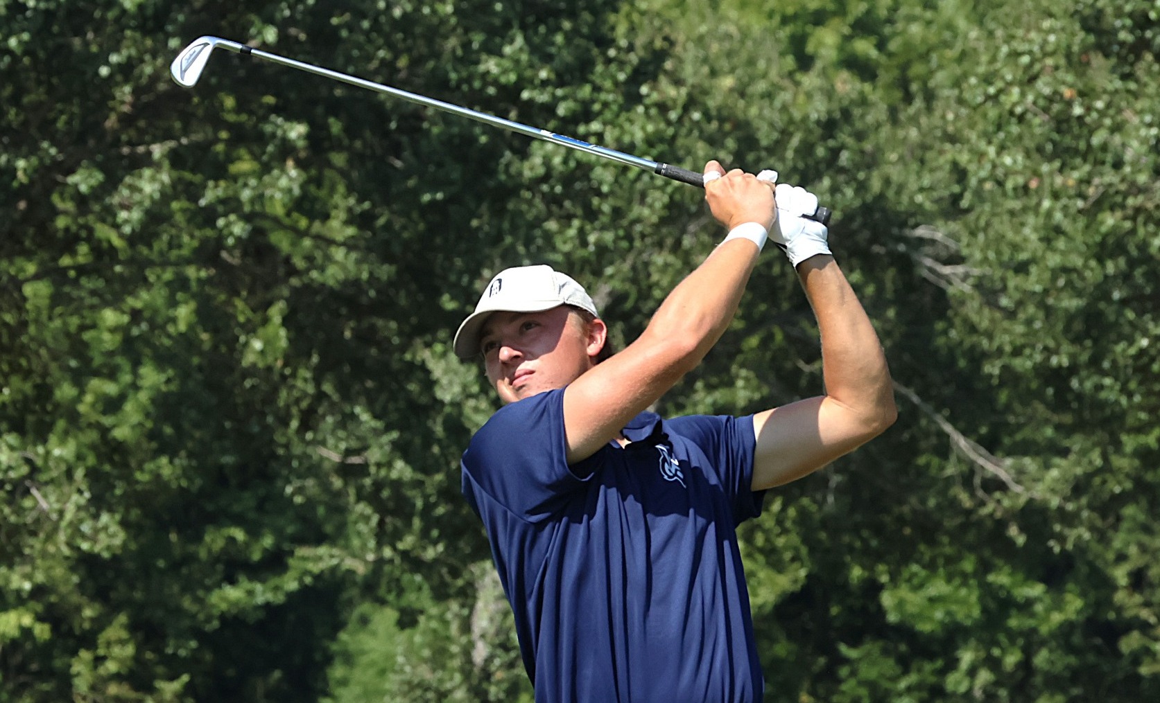 Braden Beverage hits a tee shot