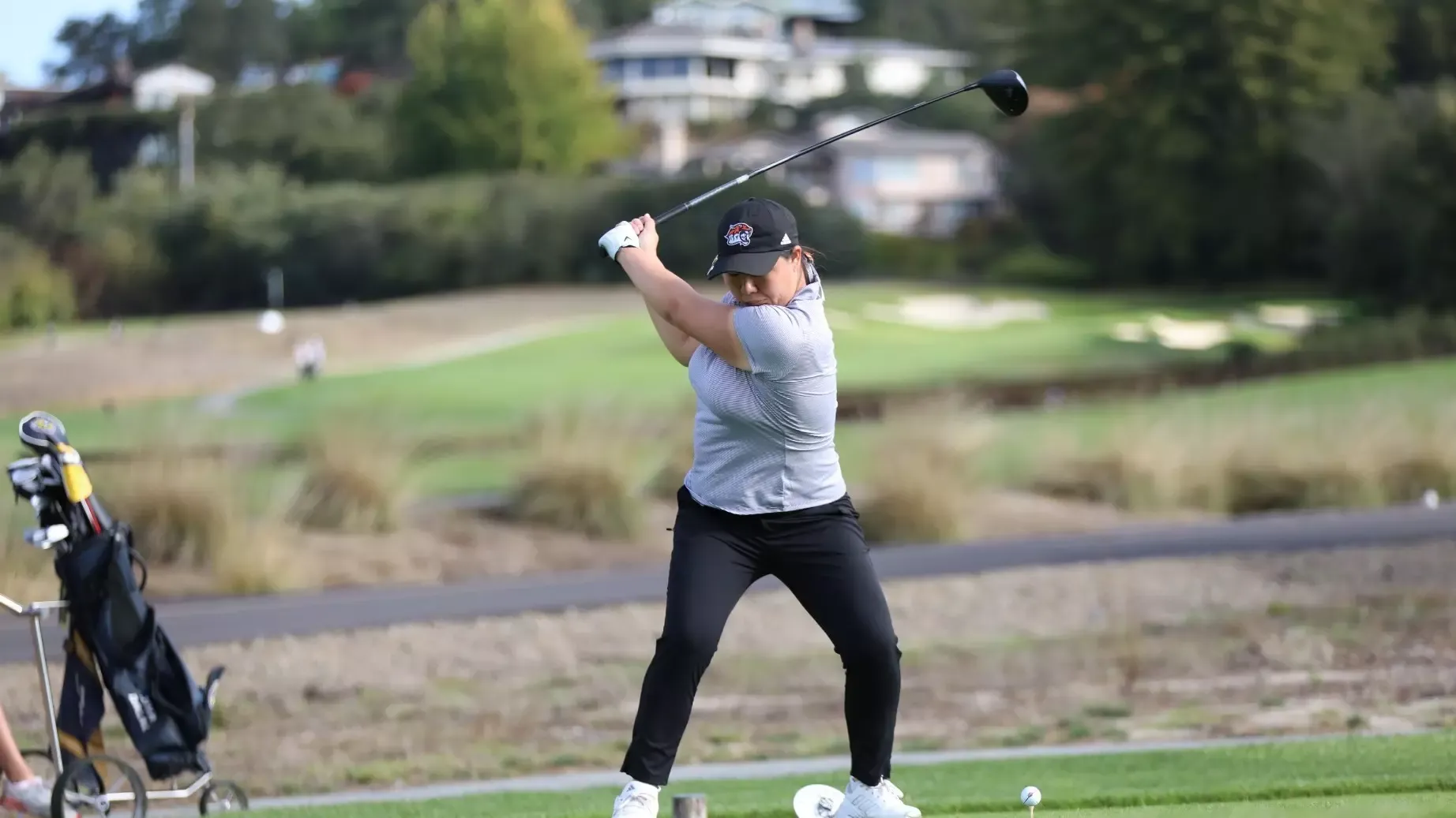 Amy Seo swings a tee shot at the Hollins Cup