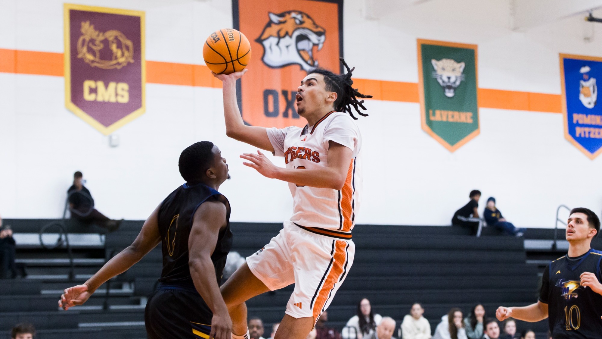 Nasir Luna goes up for a layup