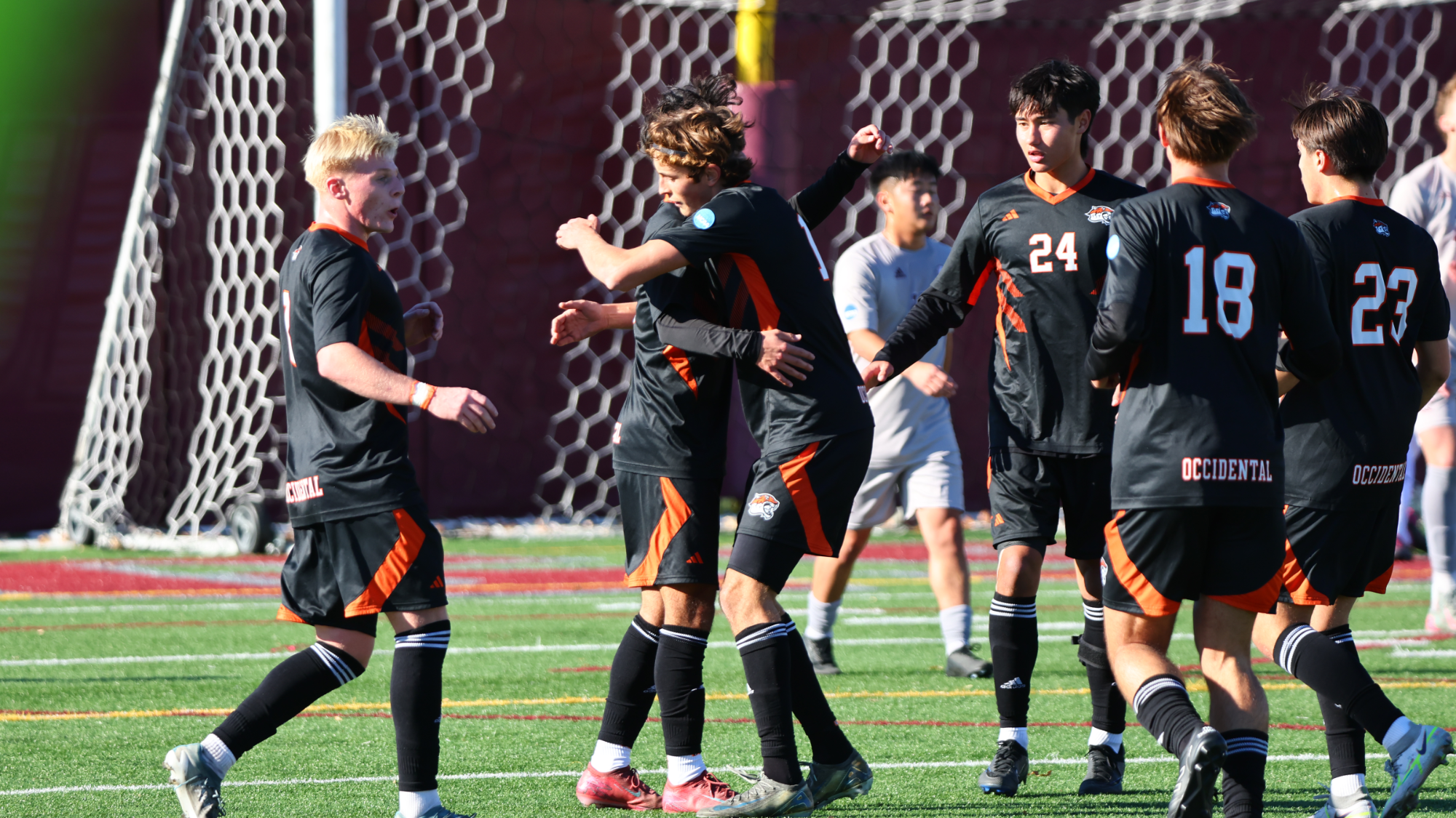Tyler Na-Nakornpanom and Aiden Aley celebrate the tigers' goal