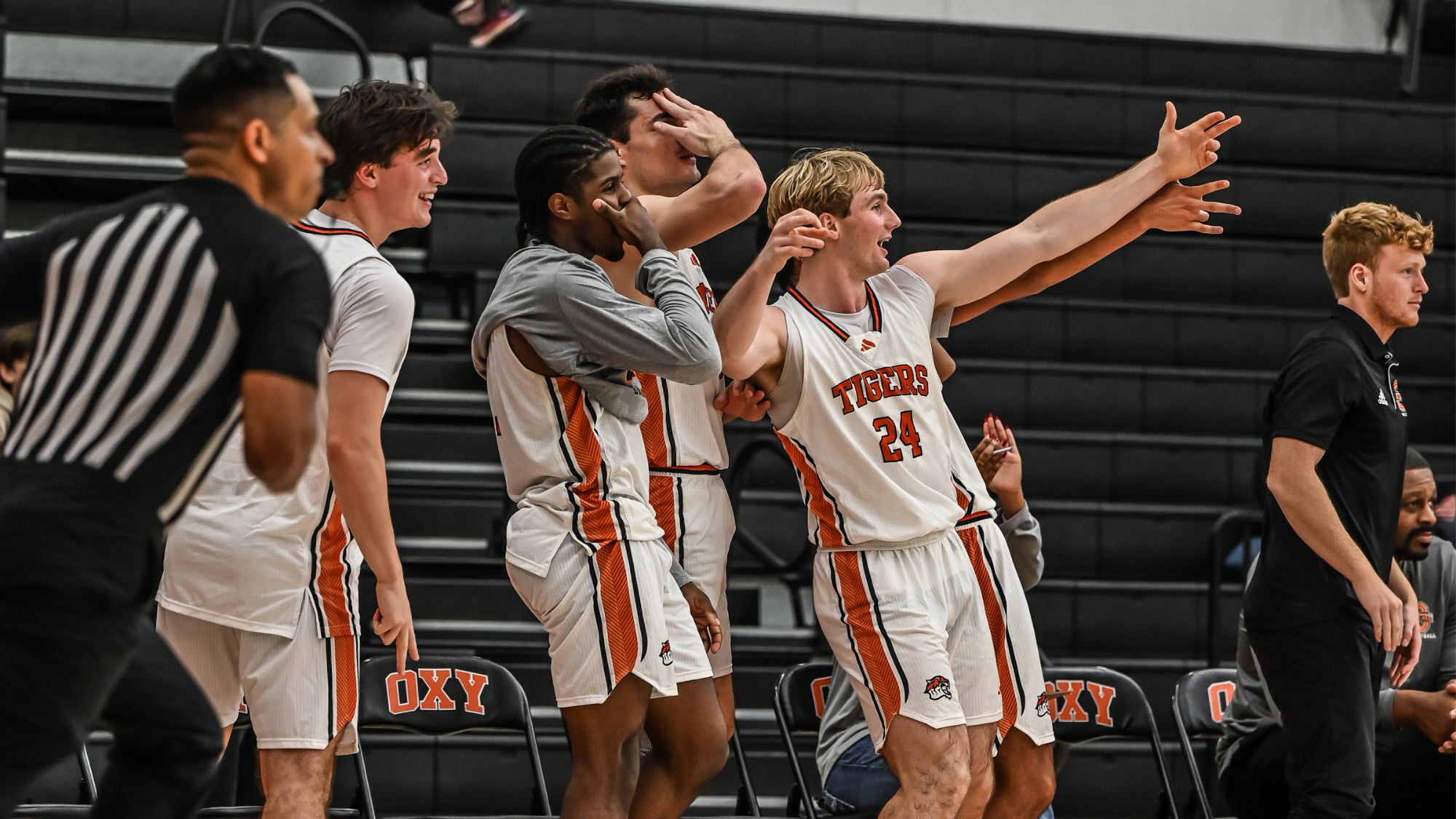 bench celebrates a three pointer