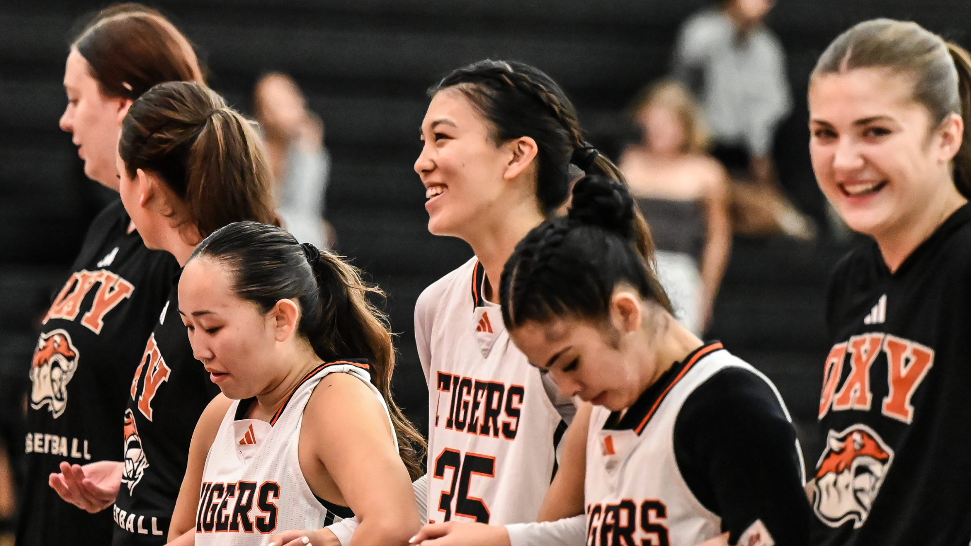 Paige Yasukochi smiling in the middle