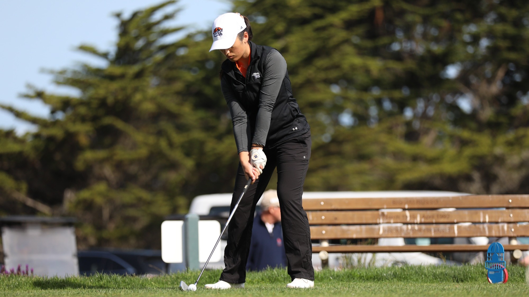 Rachel Aujero lines up a tee shot
