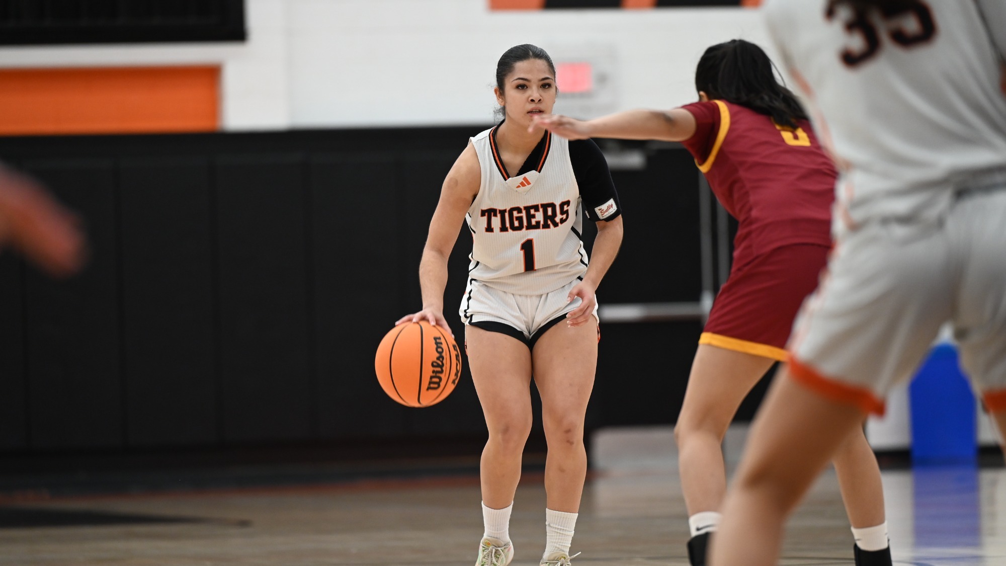 Dominique Cabading dribbles up the court