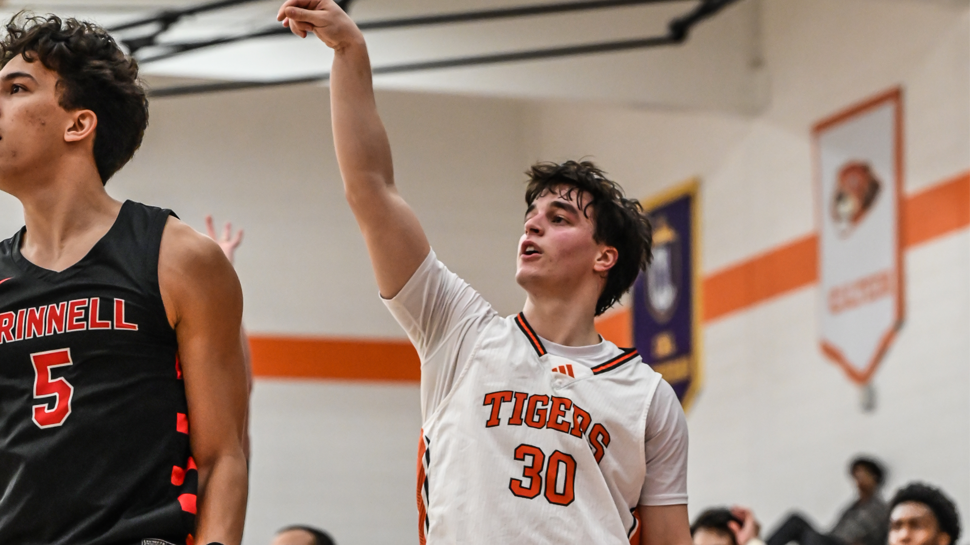 Peter Noble shoots a three