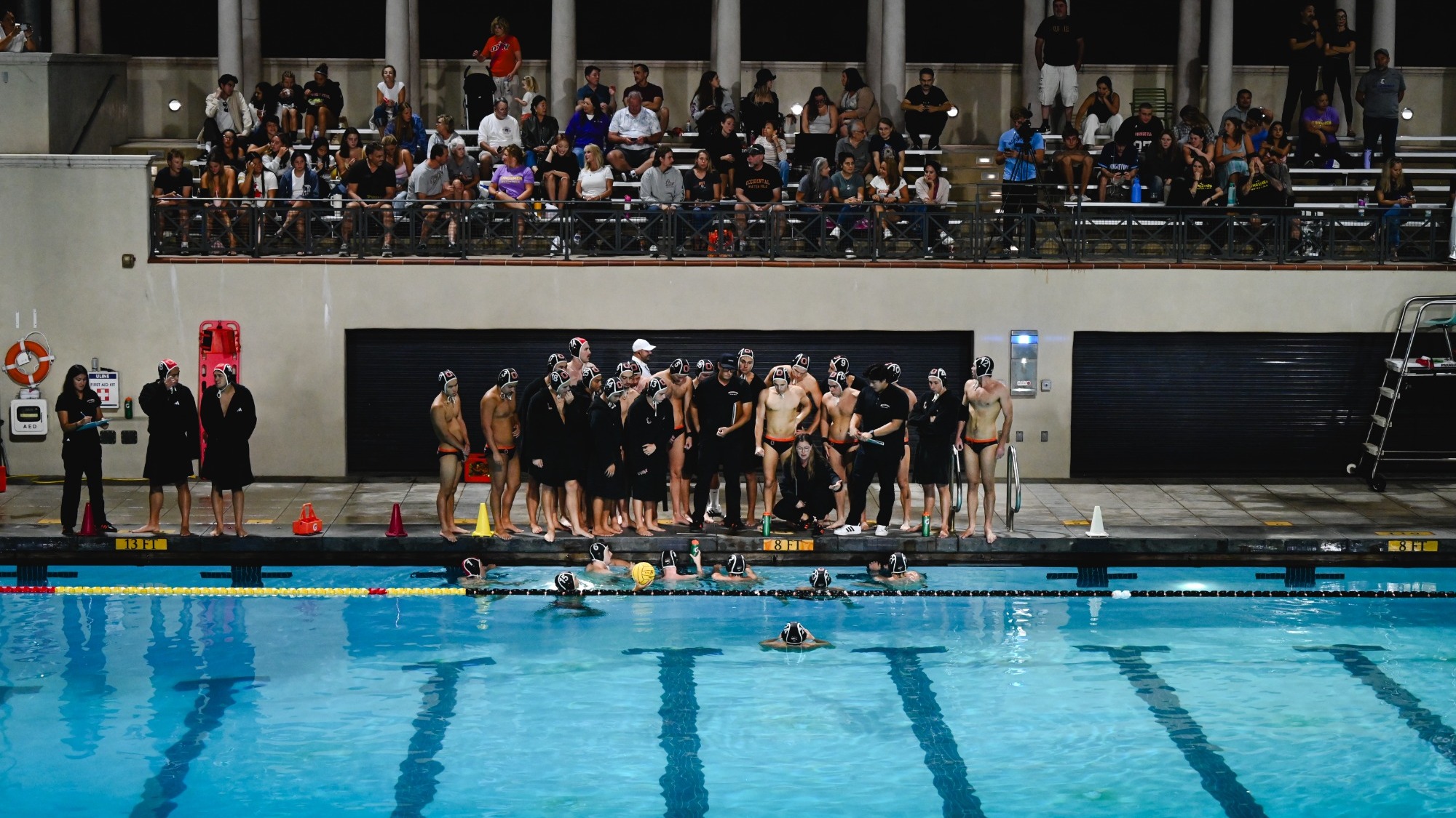 men's water polo team huddle