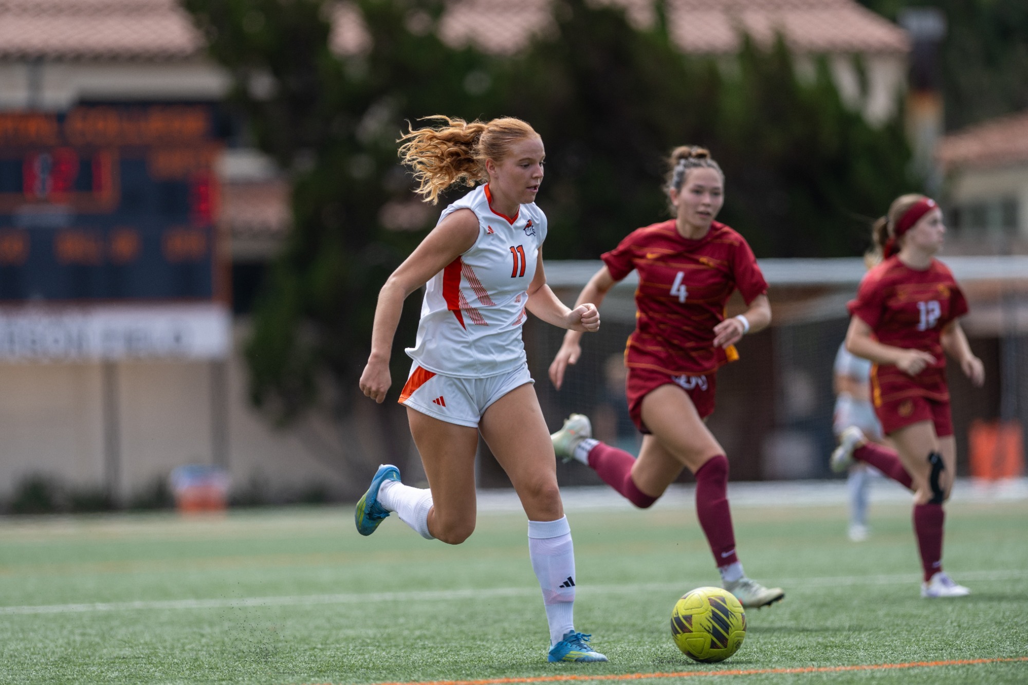 Tess Adlam dribbles vs CMS