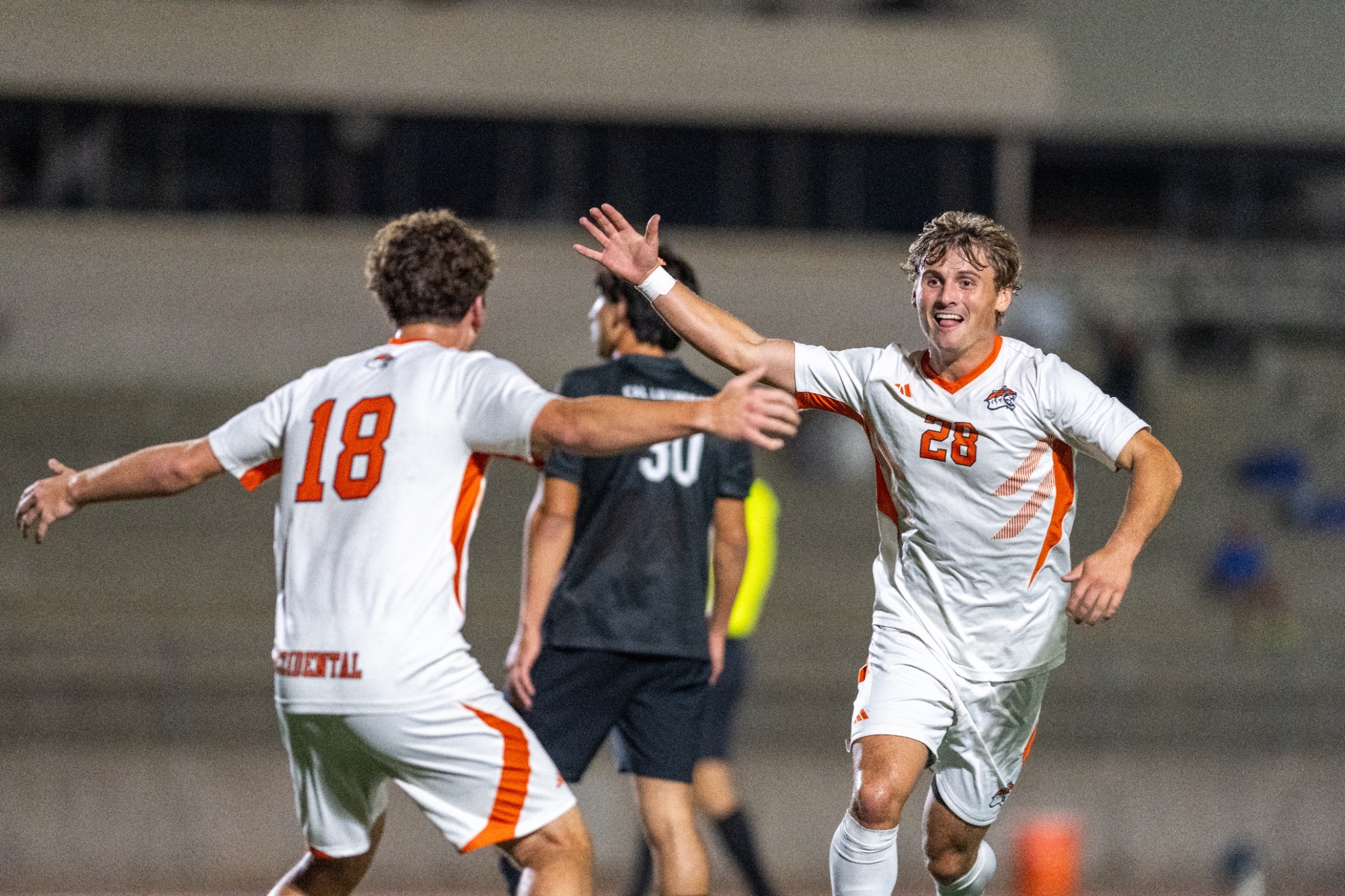 Charlie Miller celebrates a goal