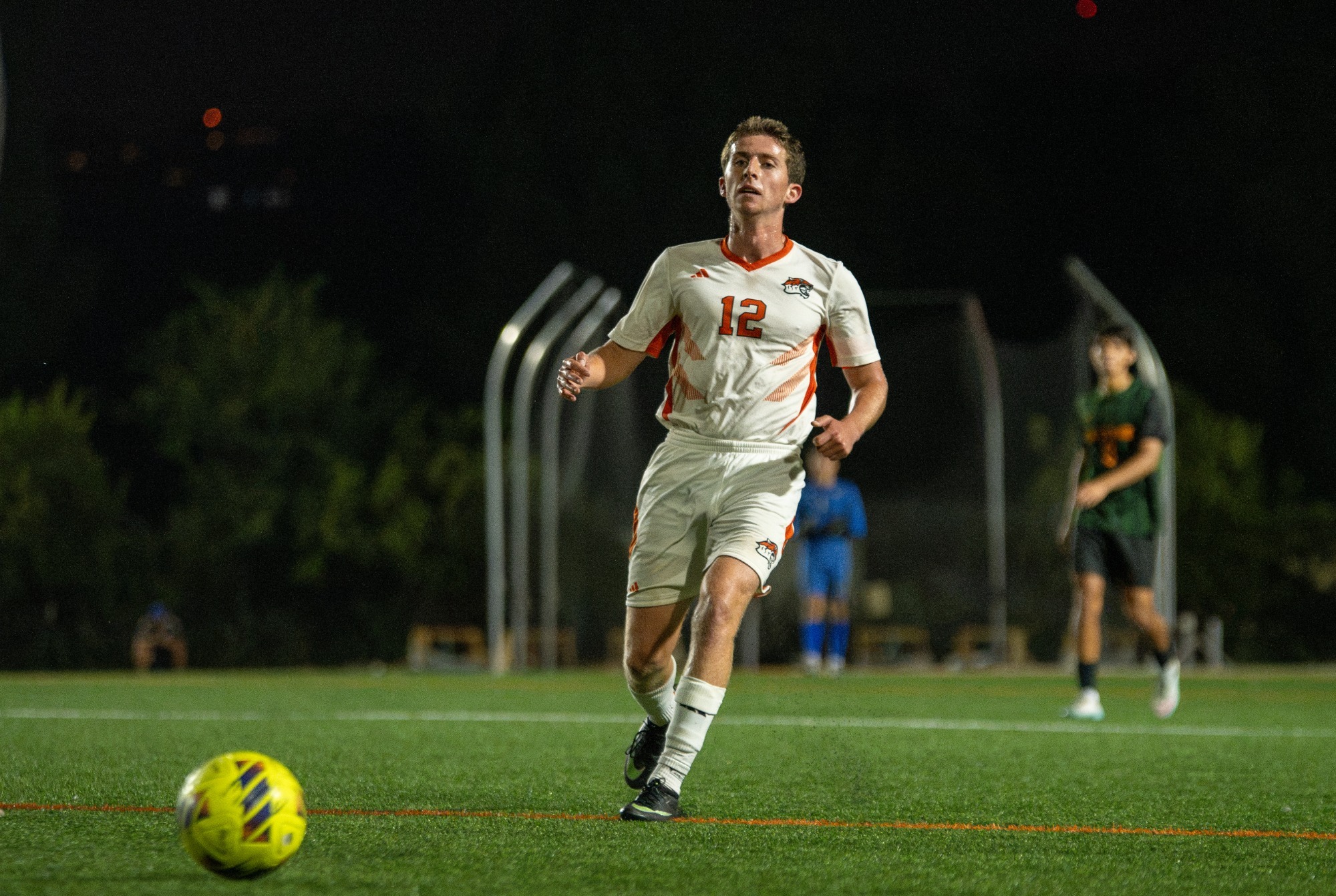 Ethan Carr chases a ball