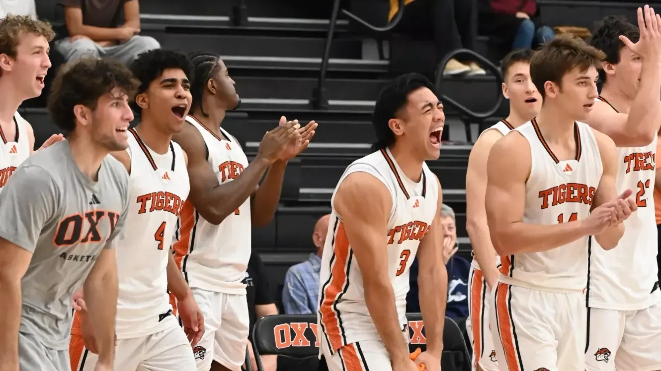 MBB celebrates win over #10 Redlands