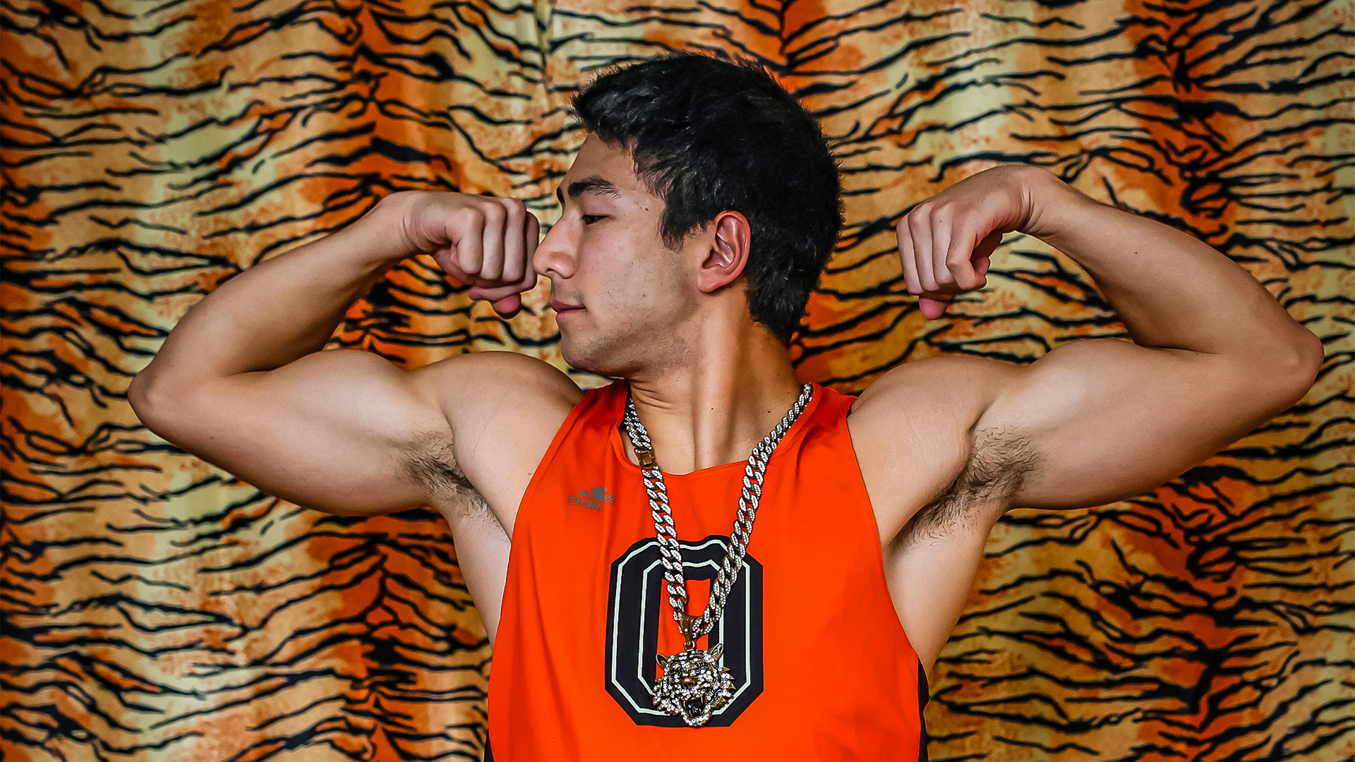 Collin Glick flexes his muscles