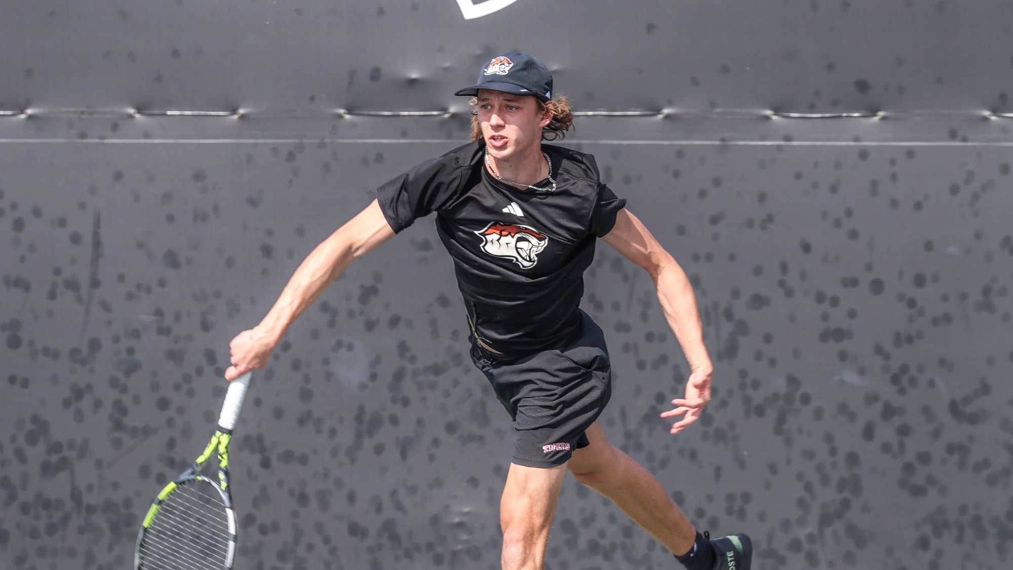 Tate Ransom hits a serve