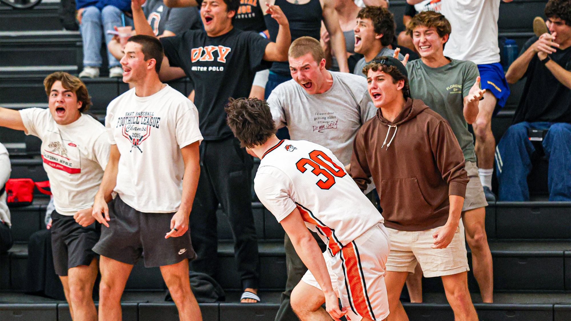 Peter Noble celebrating a three-pointer with the crowd