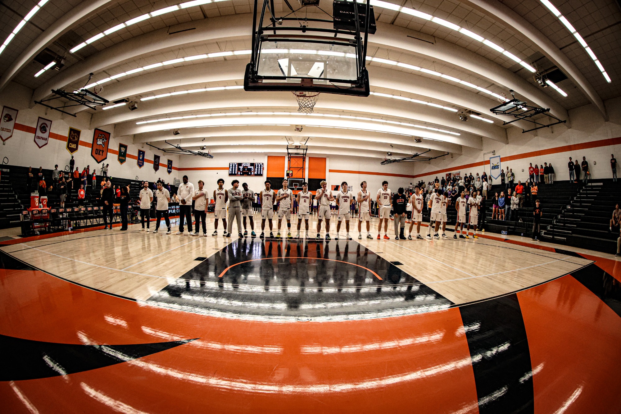 The team lined up during the national anthem