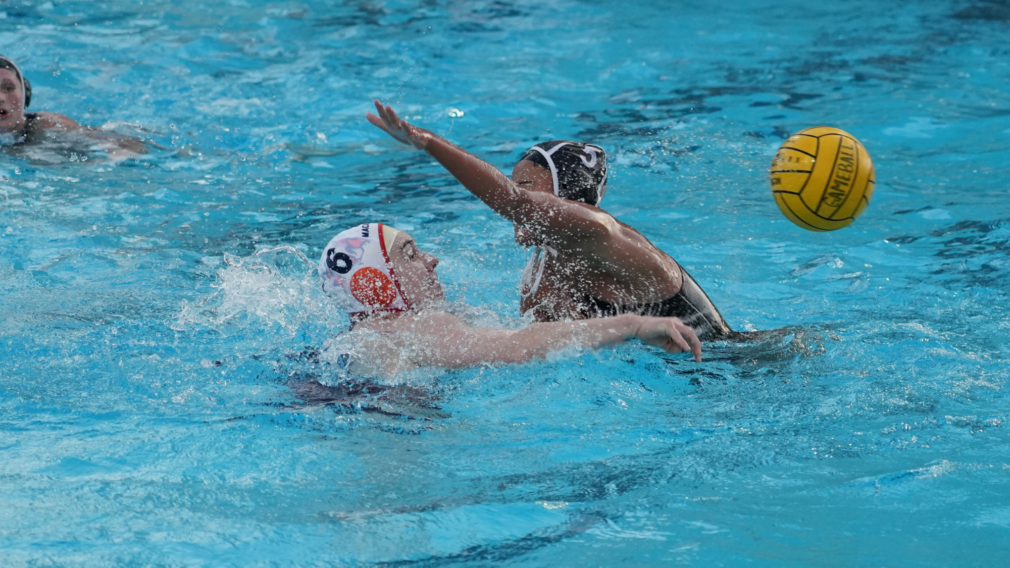 Stella Gray plays defense against Macalester