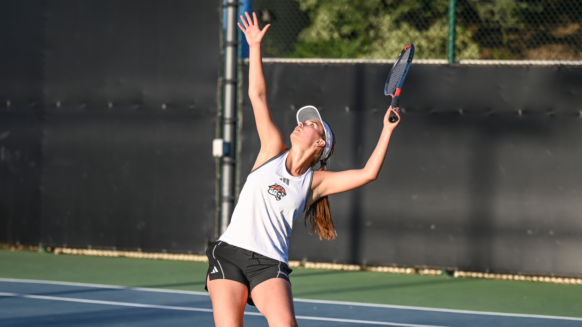 Ellise Jay hits a serve